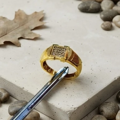 Gold tone men's ring