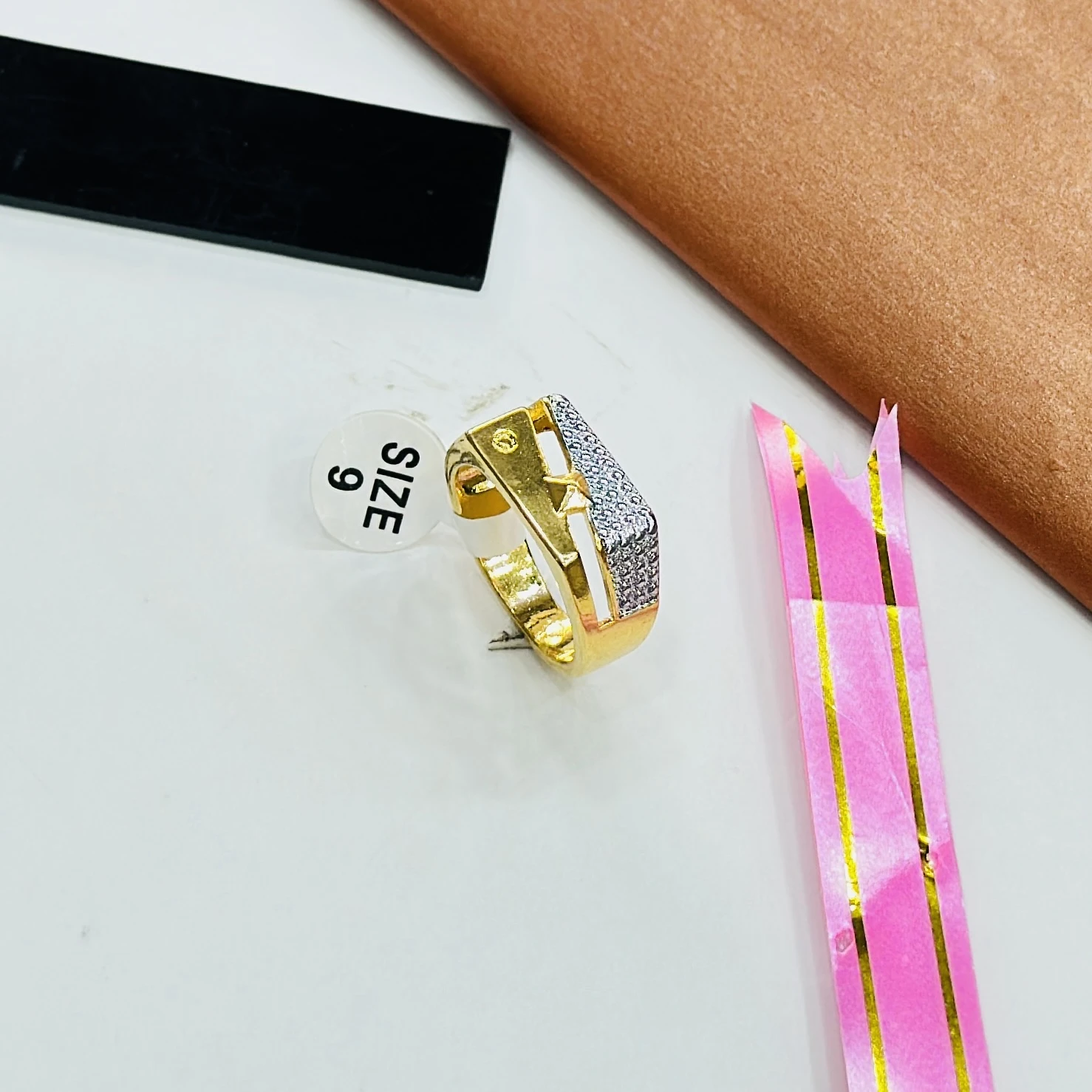 gents gold ring with American diamond embellishments
