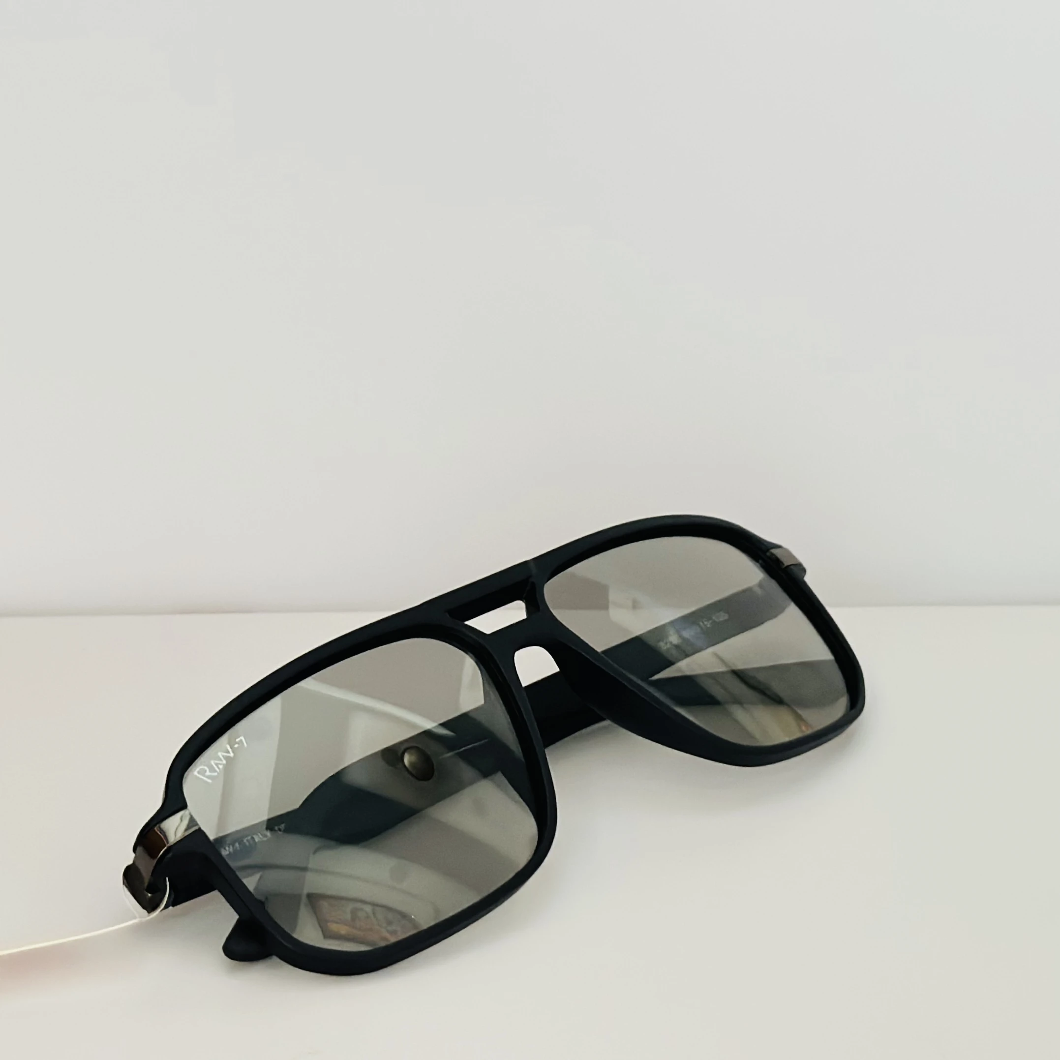 Black rectangular sunglasses