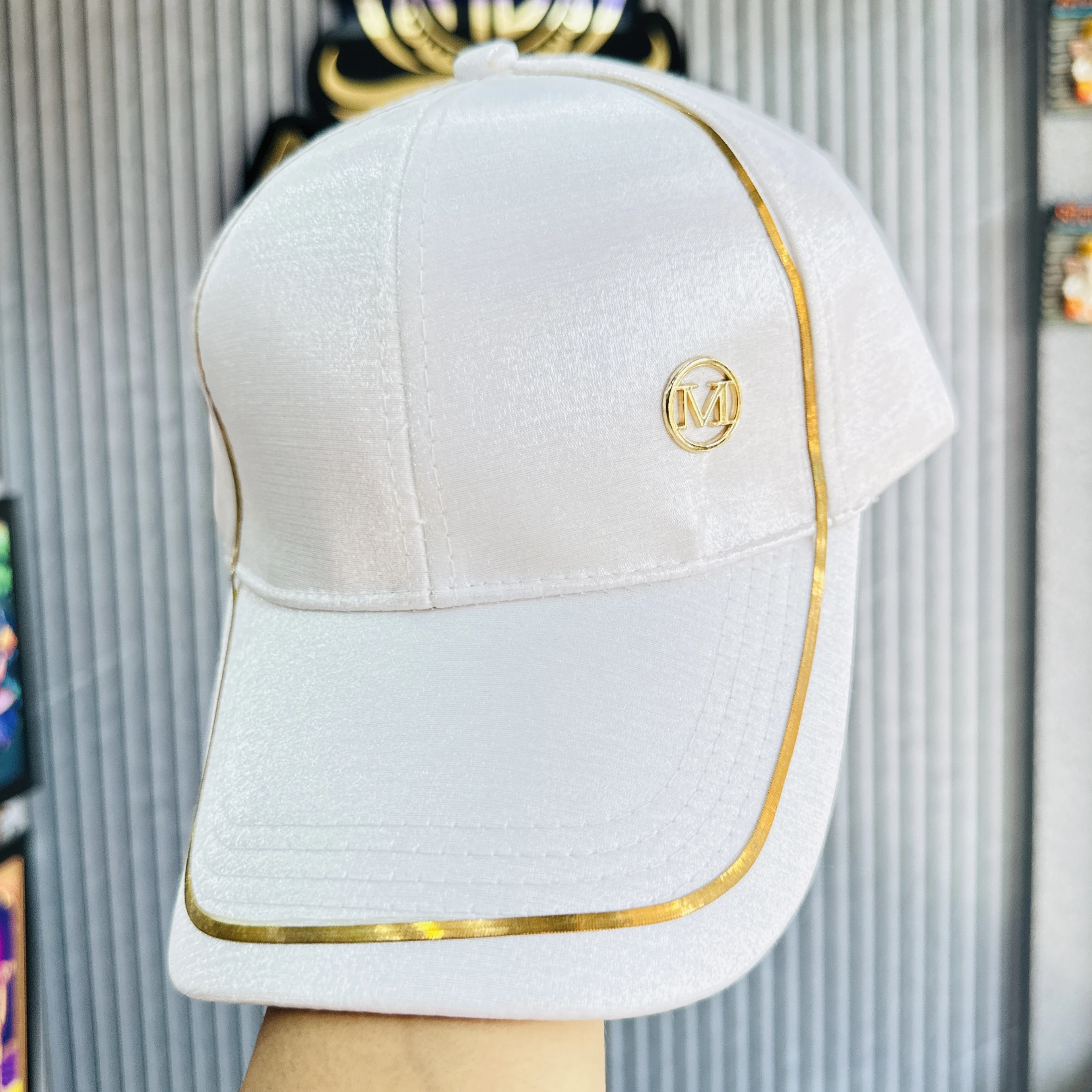 white baseball cap