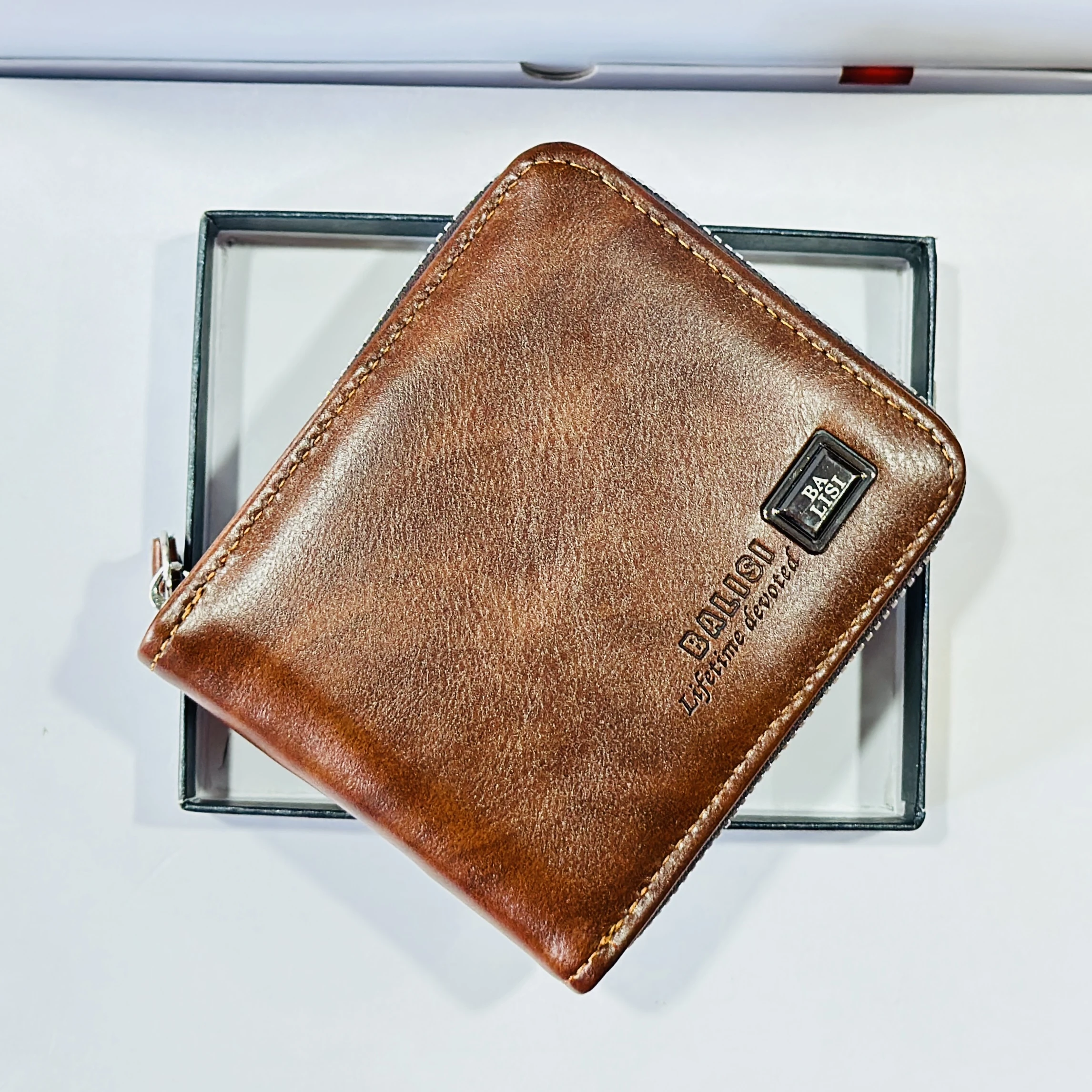 Balisi brand leather wallet features a zipper
