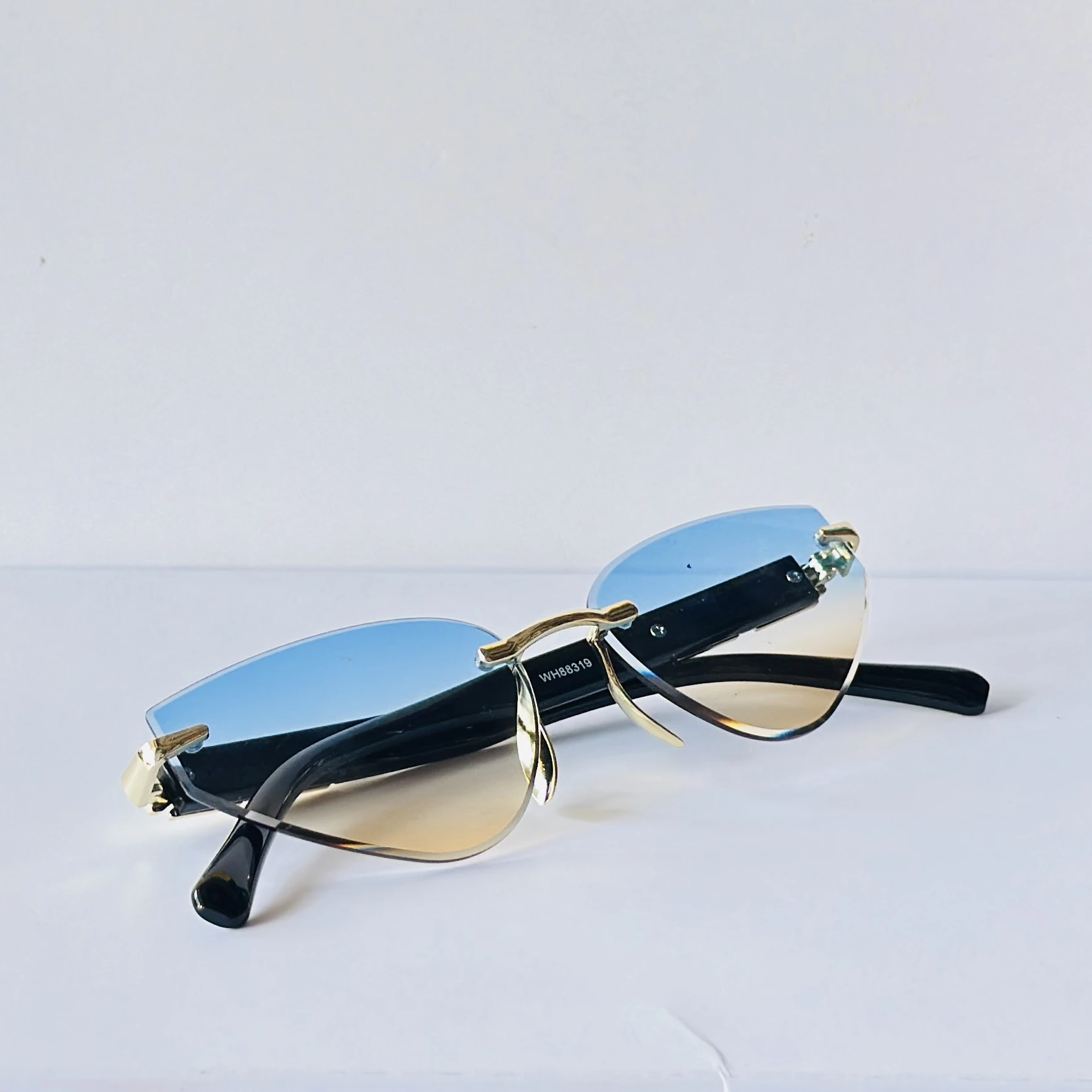 Rimless cat-eye sunglasses