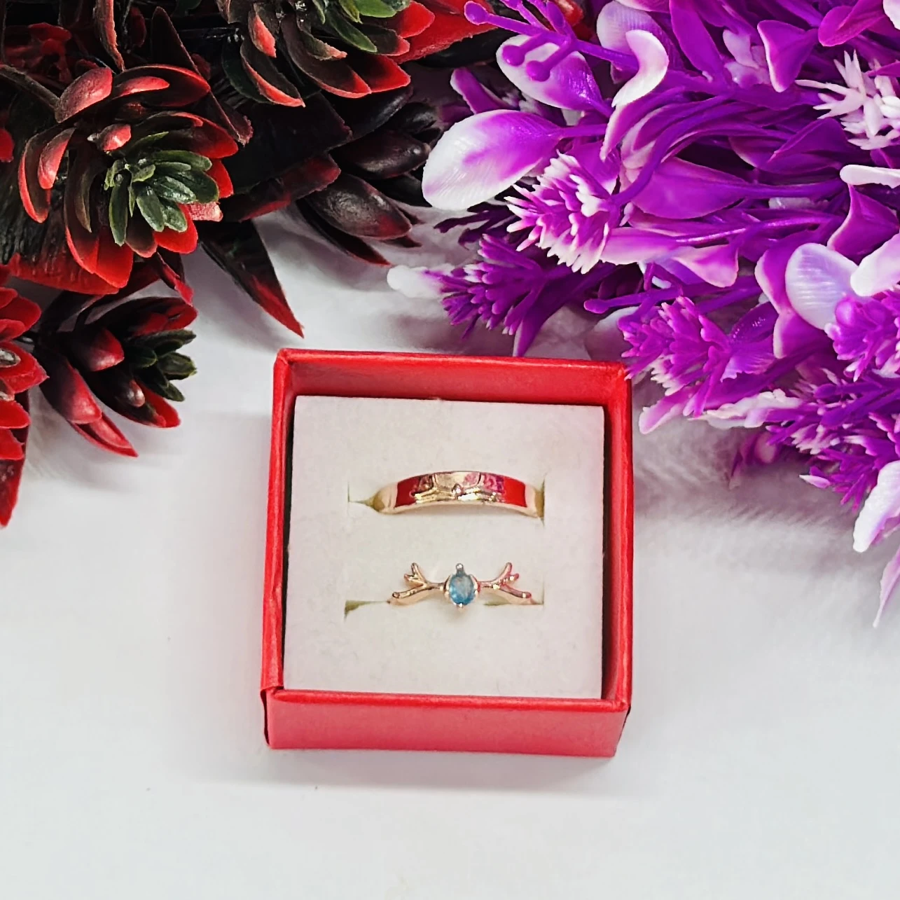Rose gold nature-inspired wedding bands featuring a plain band and a twig branch ring