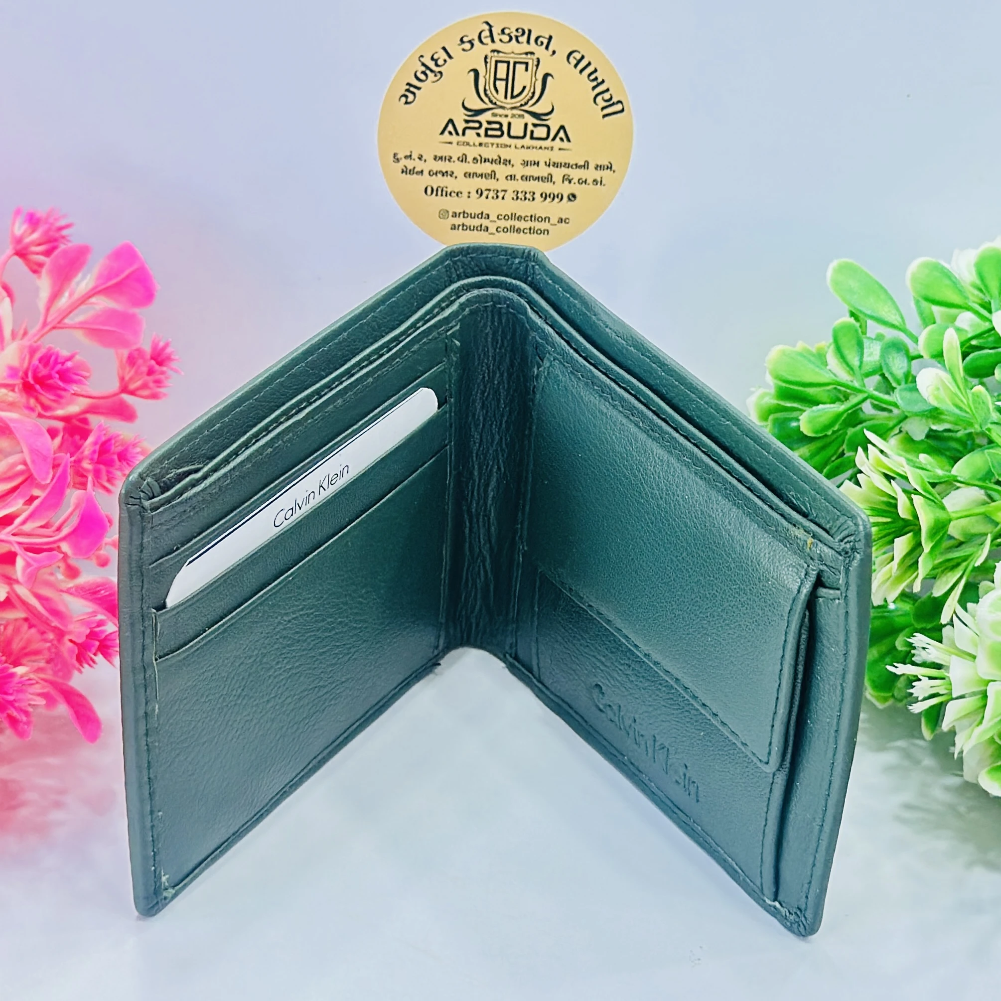 Calvin Klein green bifold leather wallet