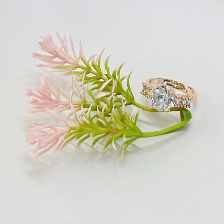 An adjustable art deco style ring