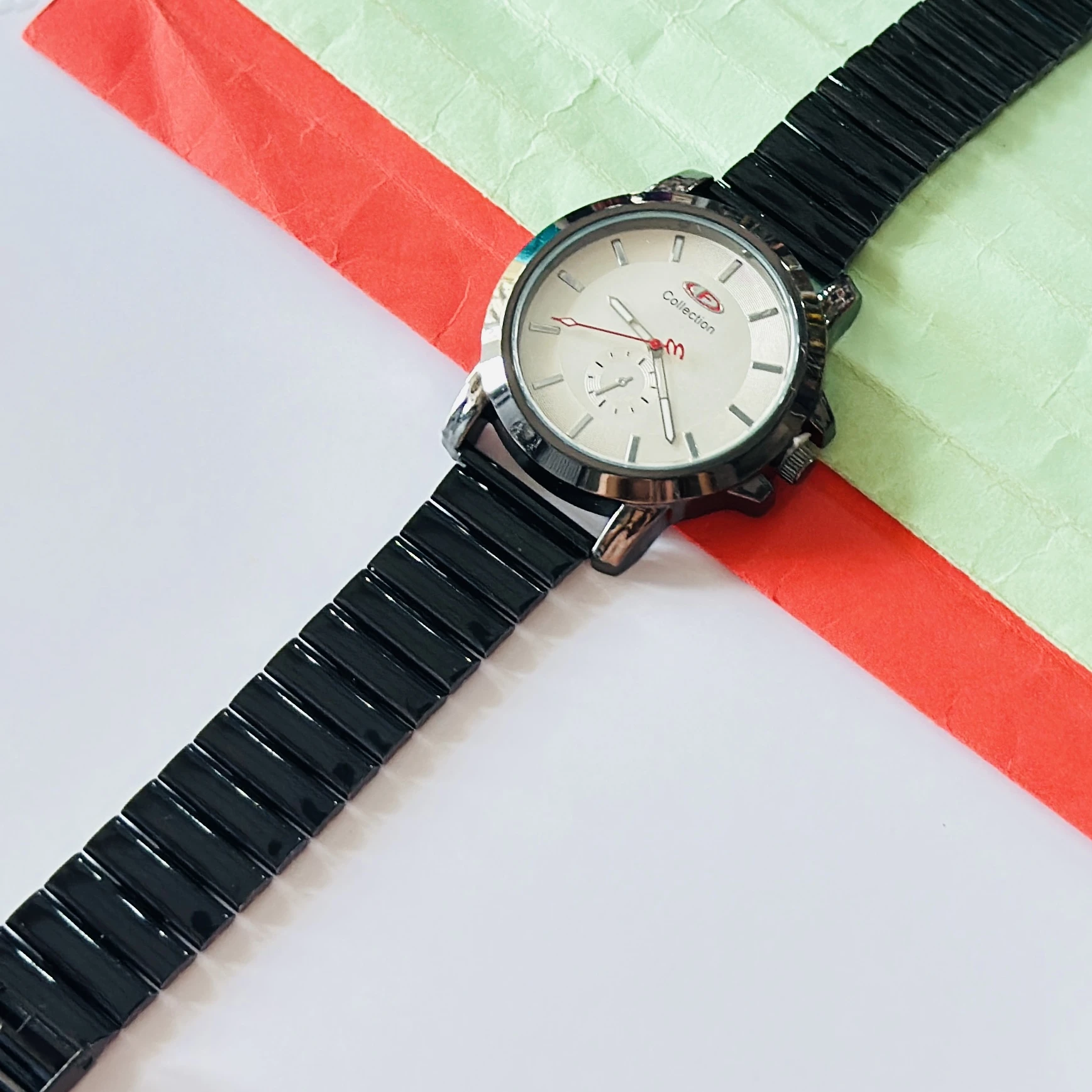 Silver toned analogue watch