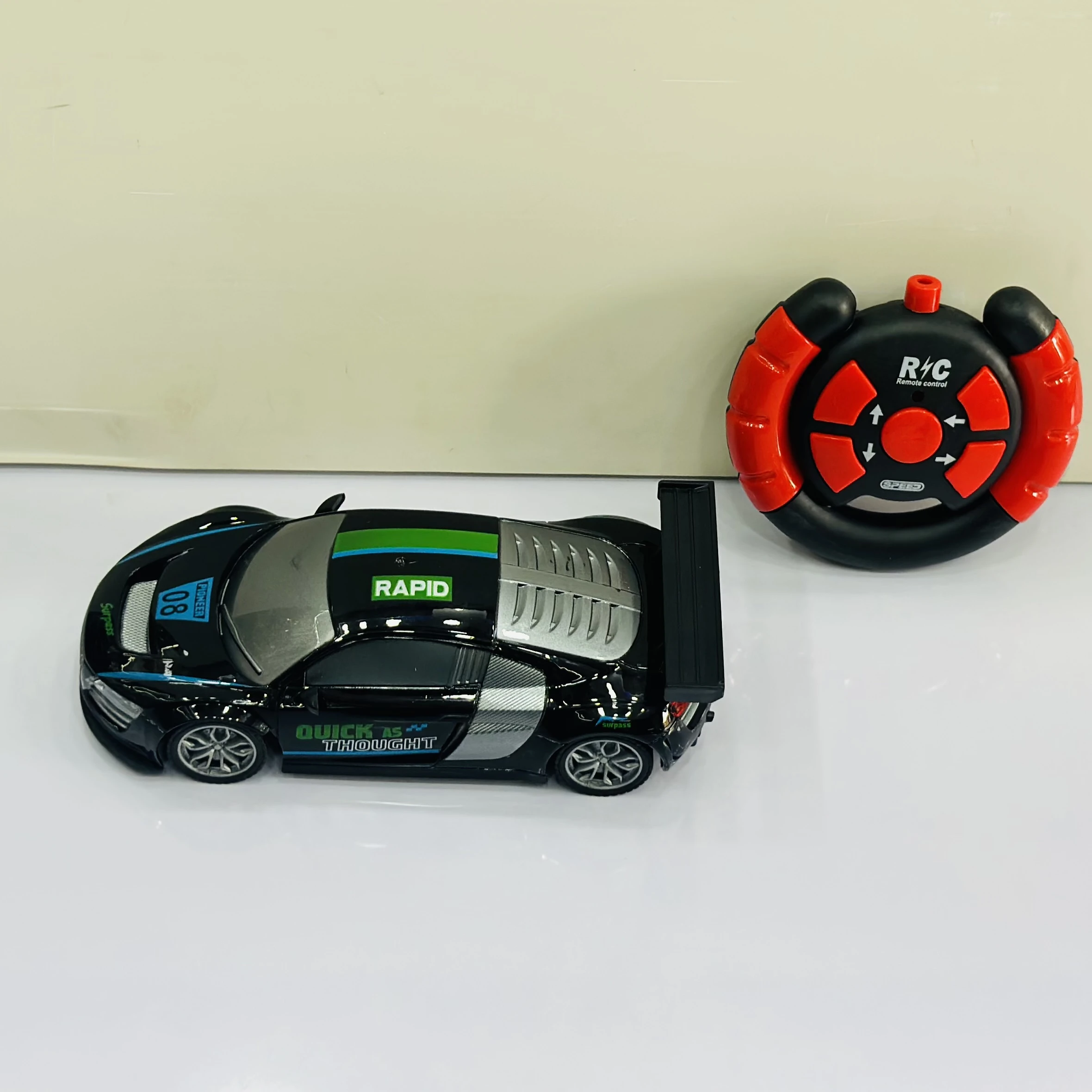 Firerace Championship" 1:18 scale remote-control (R/C) toy car.
