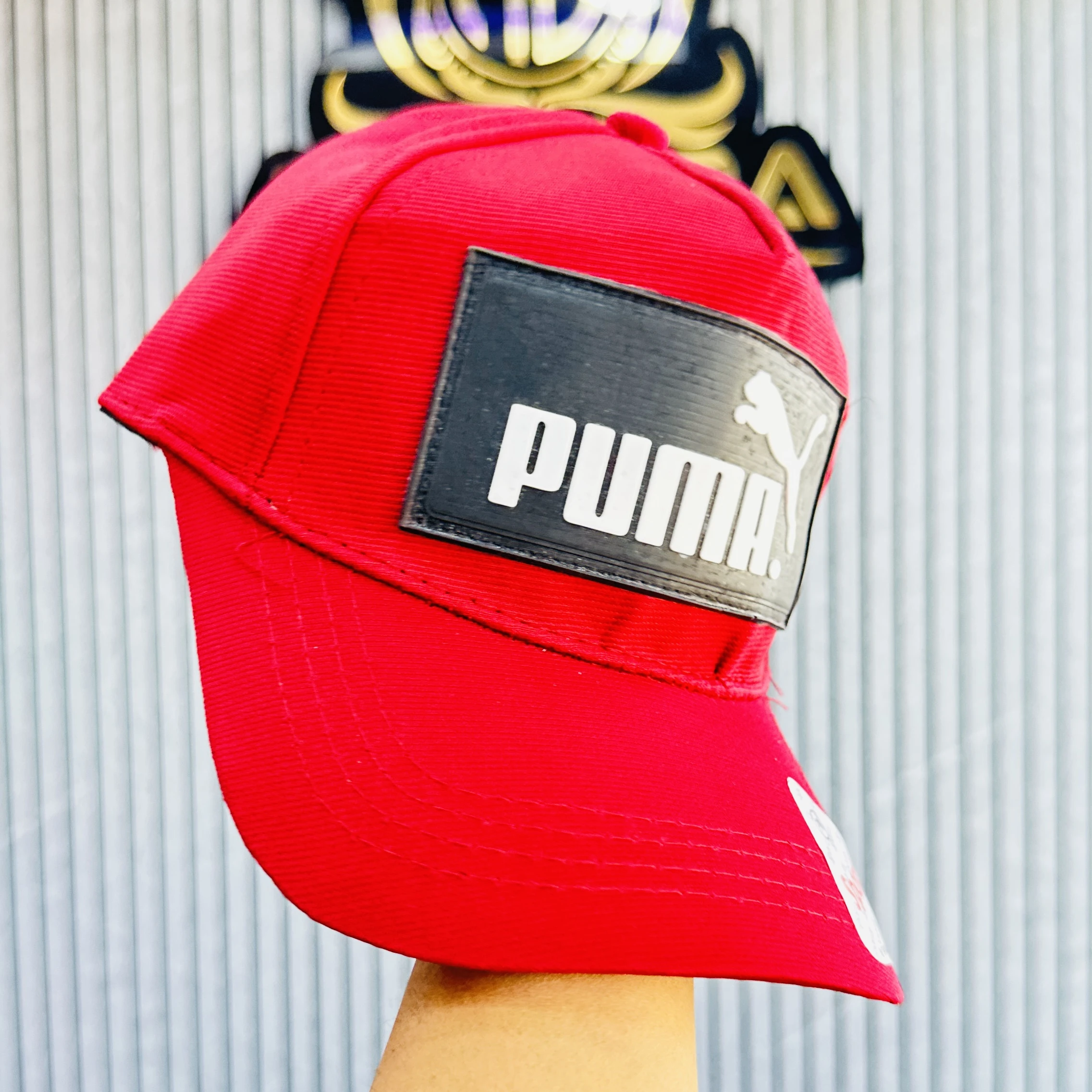 Red PUMA baseball cap,