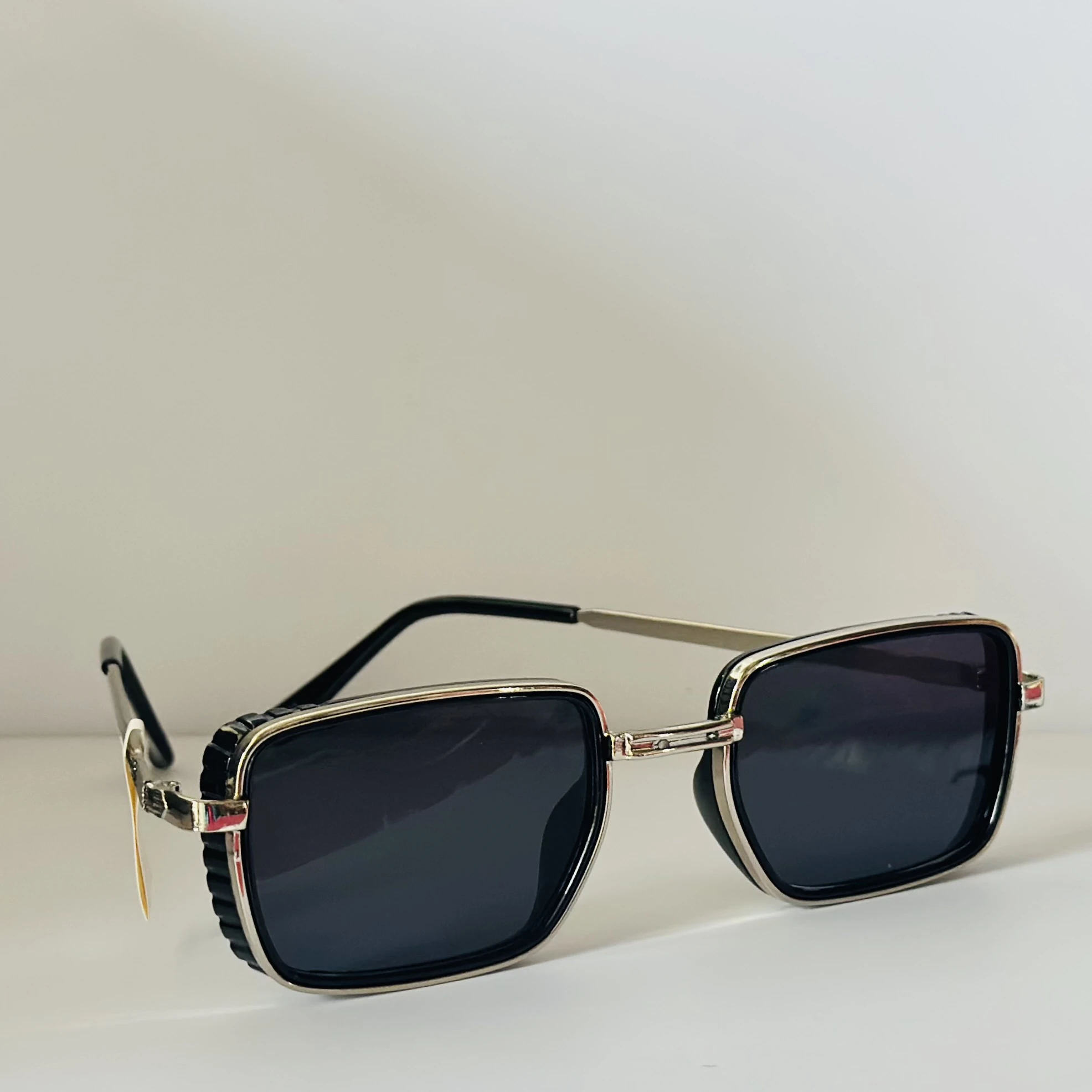 pair of Aedoll Goggle sunglasses with a gold metal frame and pink gradient lenses.