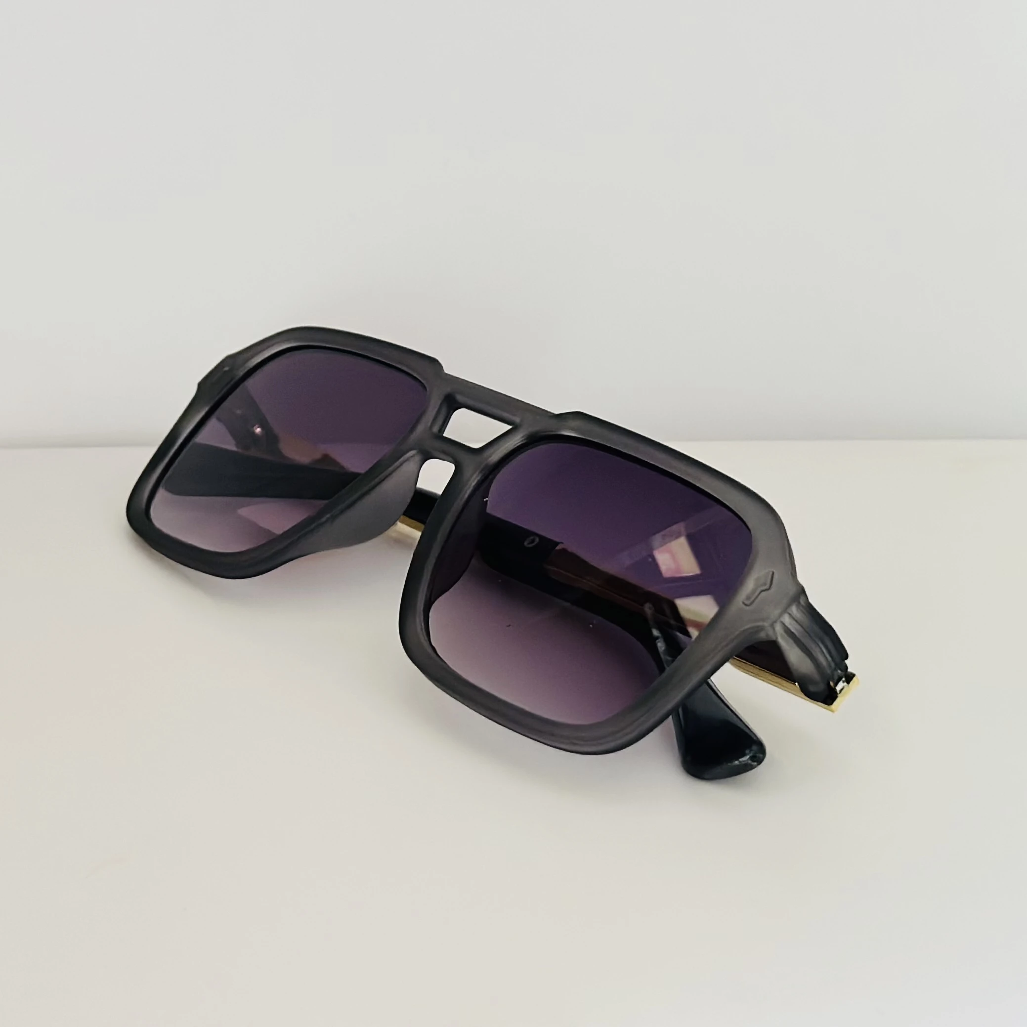 Cutler & Gross 1394 aviator sunglasses in a brown/cherry acetate frame.