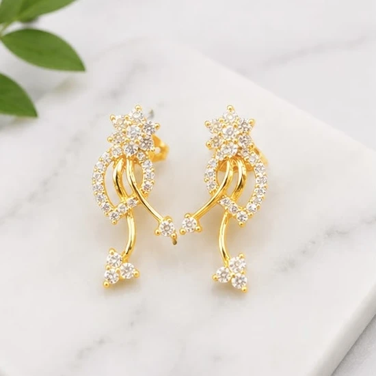 traditional Indian gold-plated drop earrings feature a triangular stud design
