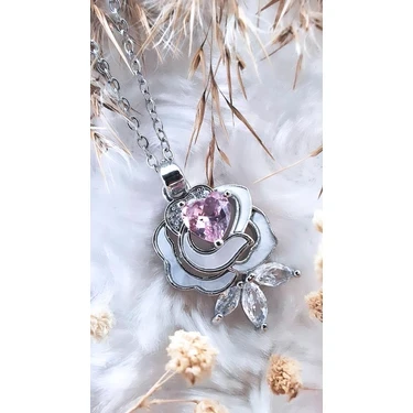 stainless steel necklace features a silver-tone pendant