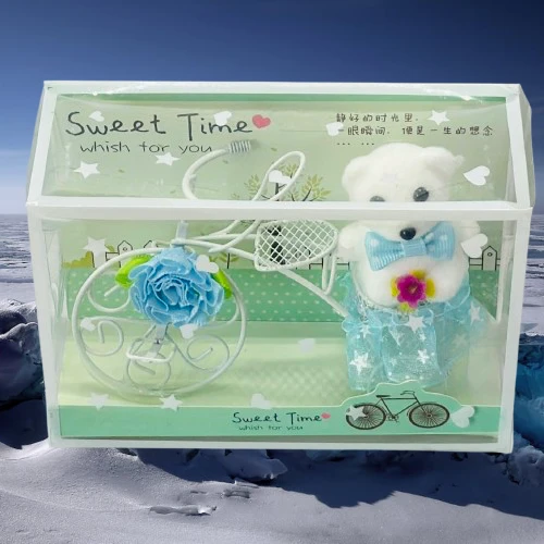 White Plastic Cycle with Teddy Bear and Rose Petals Gift Box