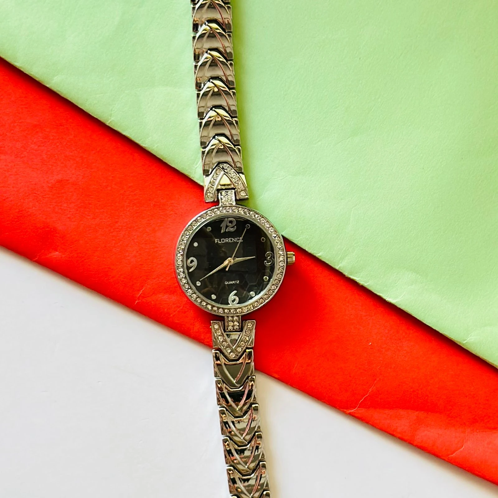 Florence quartz watch with a black dial and a two-tone stainless steel bracelet