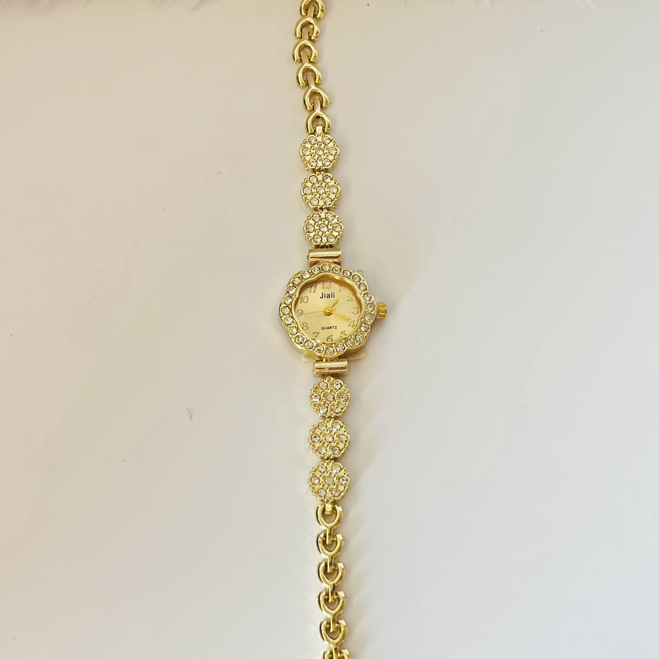 Gold tone quartz watch