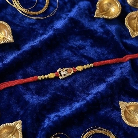 Raksha Bandhan rakhi made from a red thread (mauli).
