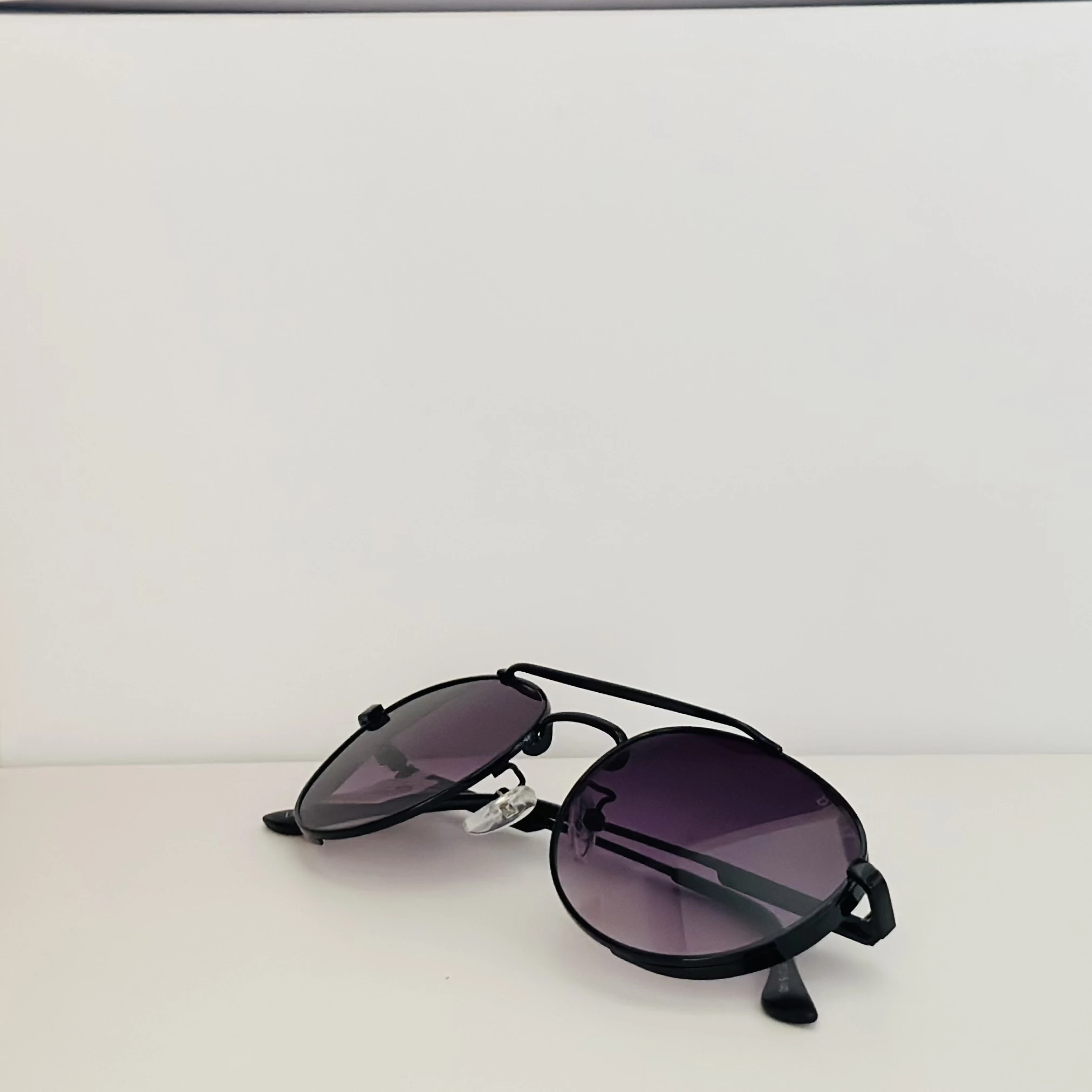 Black metal aviator-style sunglasses