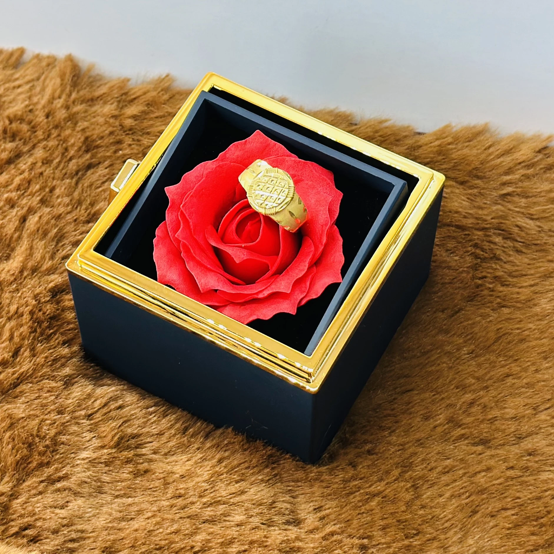 Hallmark gold ring for men displayed in a presentation box.