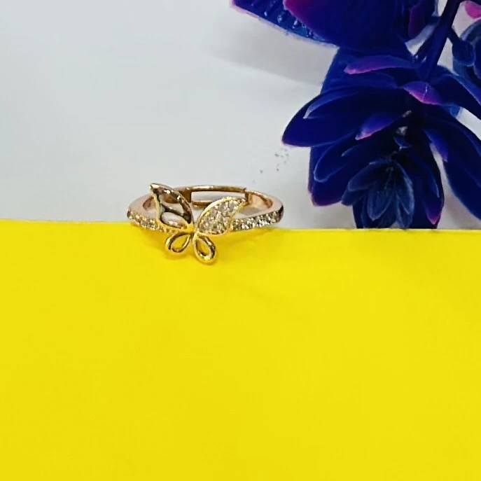 Gold plated alloy butterfly ring with a vintage style and clear stones.