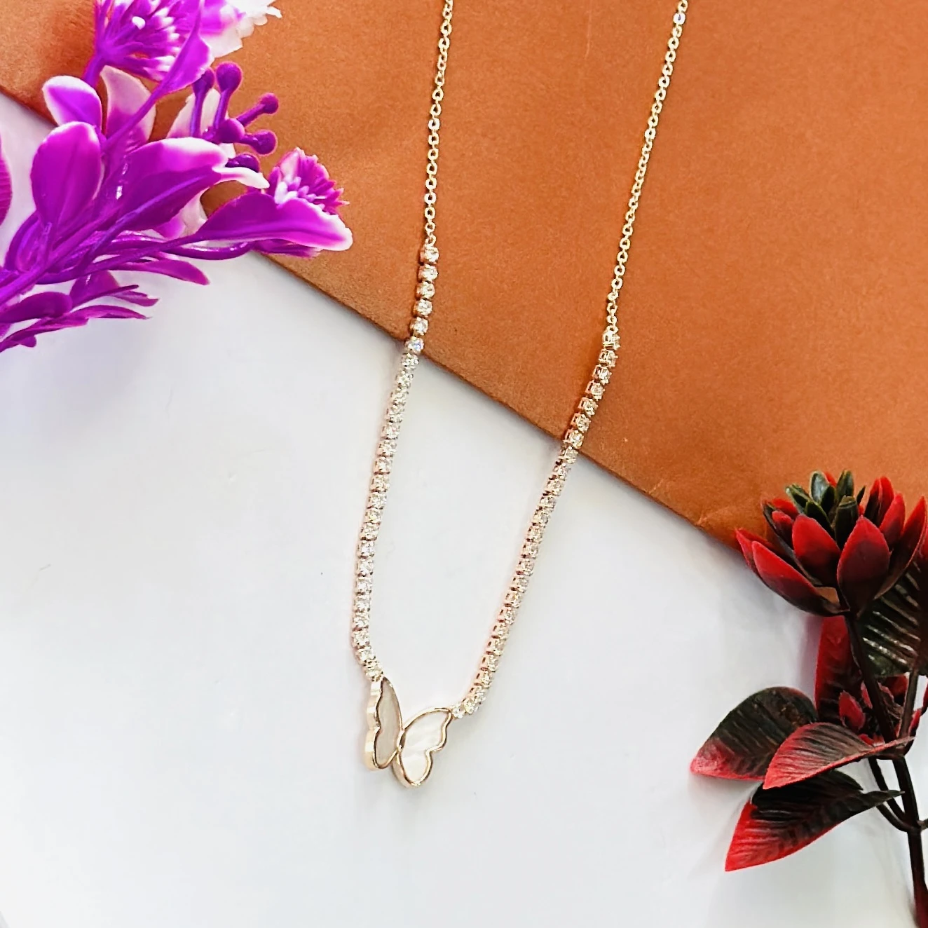 Gold tone butterfly pendant