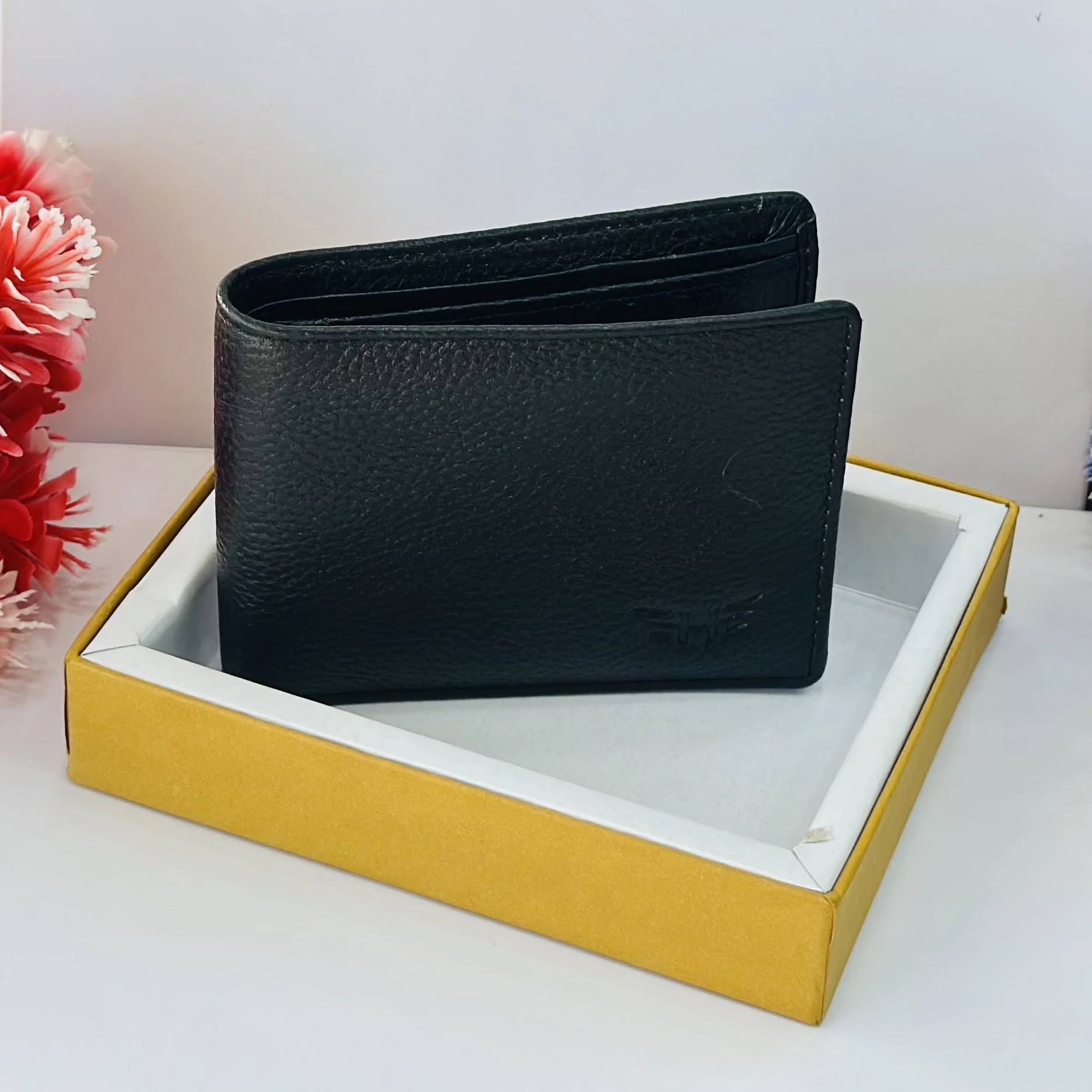 PUMA men's bi-fold leather wallet in black.