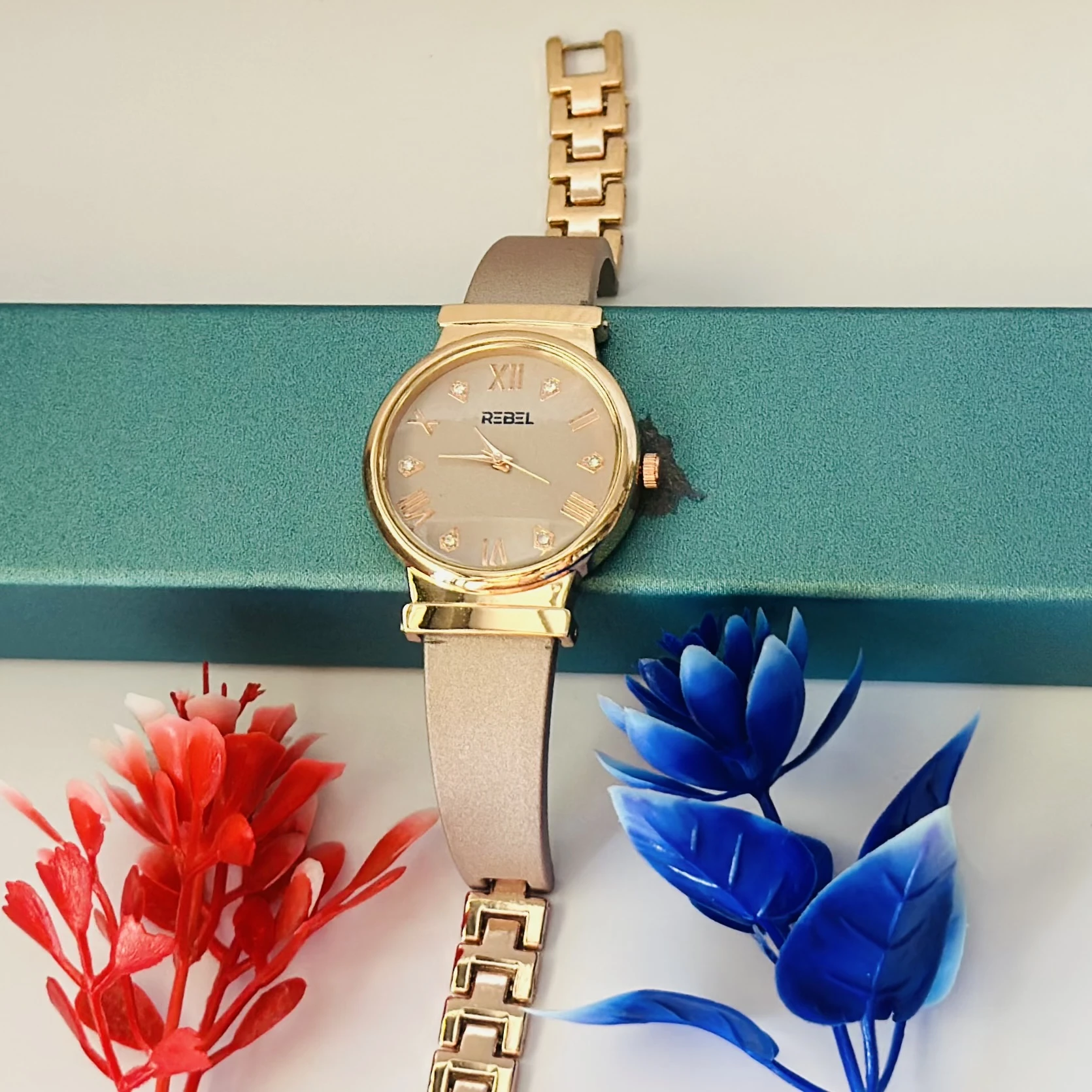 Rose gold analog watch