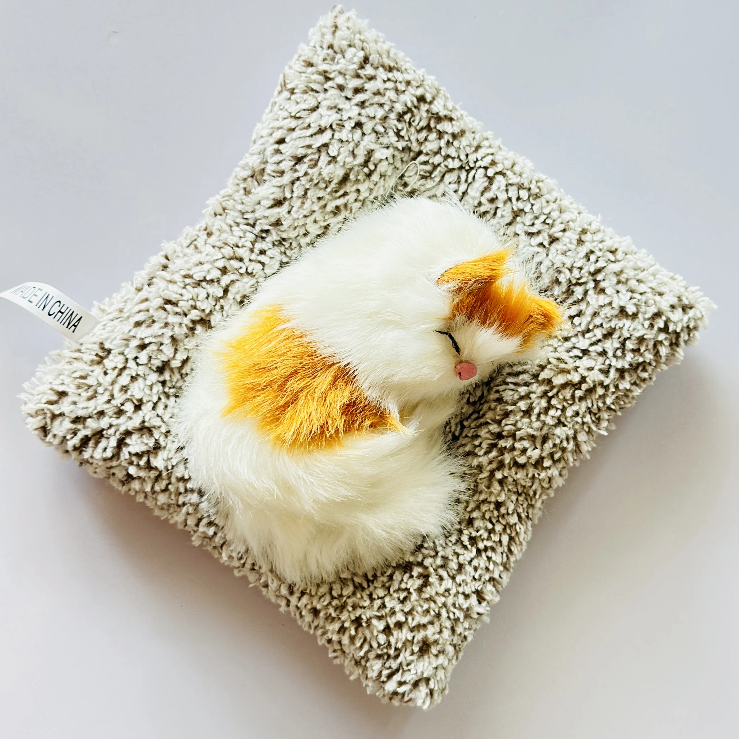 Realistic sleeping cat plush toy
