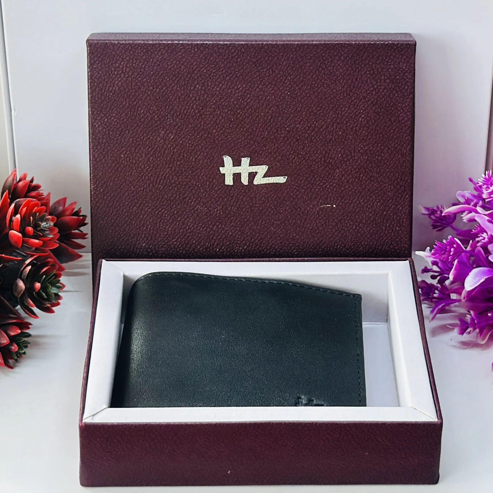 HZ men's bifold wallet made from genuine leather.