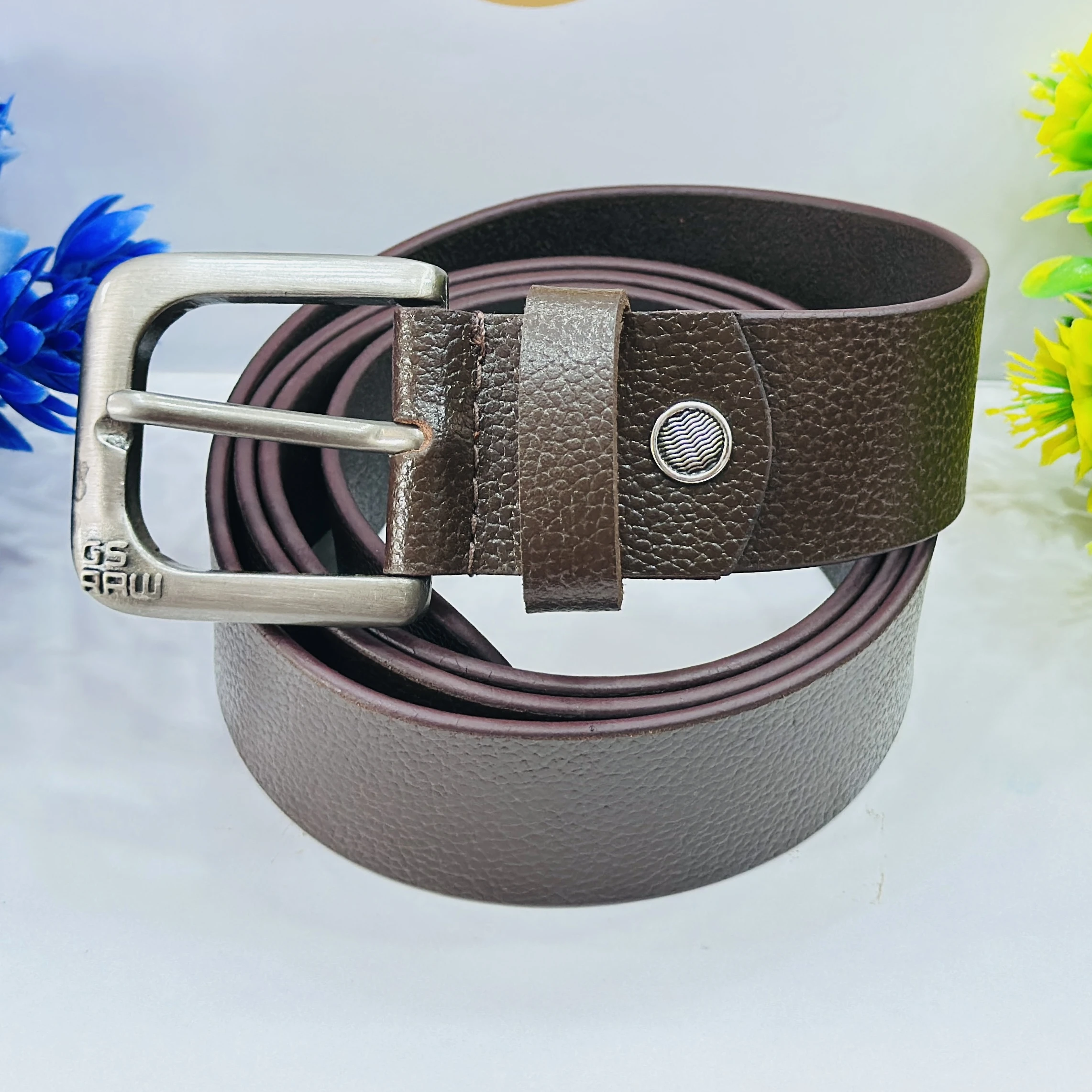 Based on similar products, this is a men's brown leather casual belt.