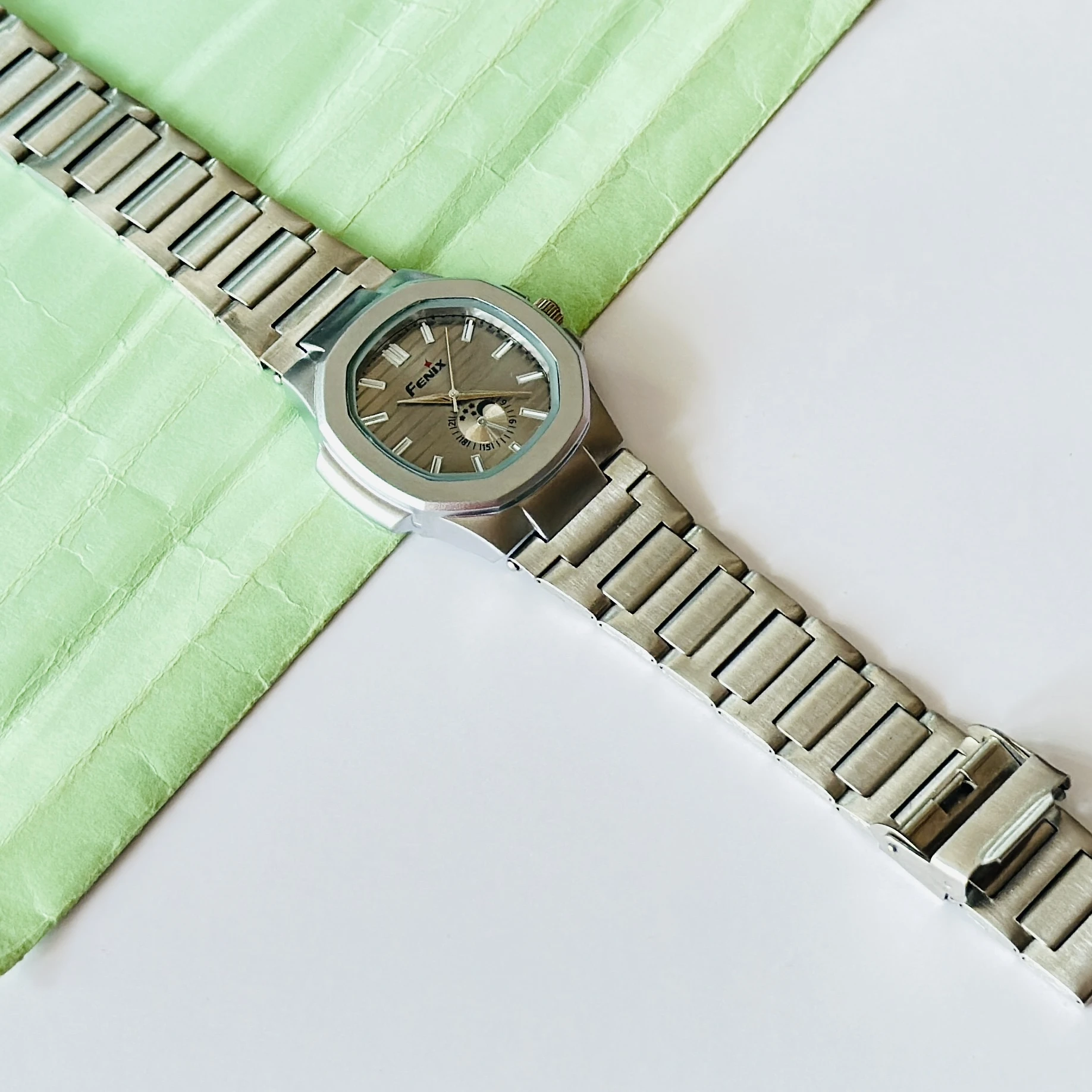 silver-toned stainless steel analogue watch