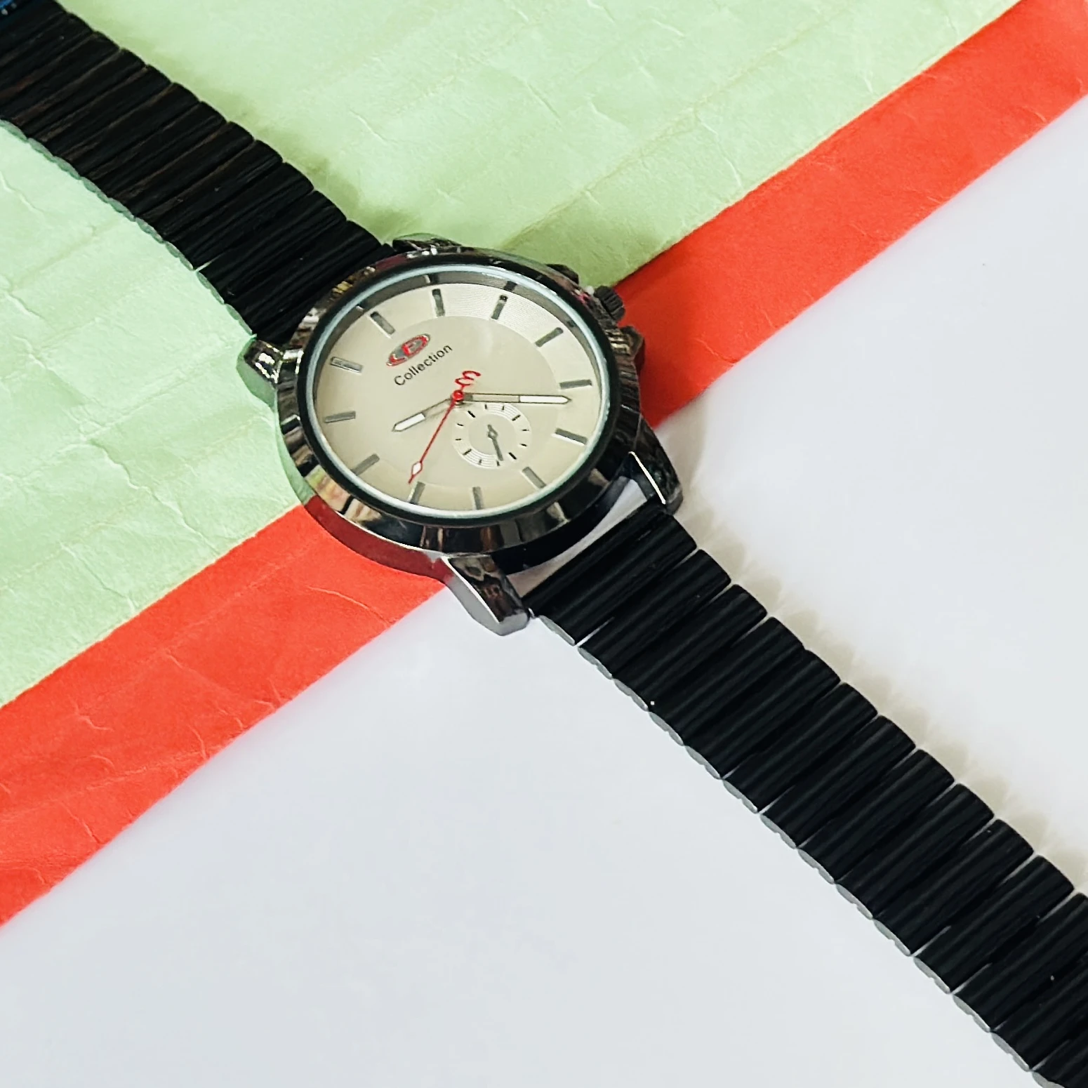 Silver toned analogue watch