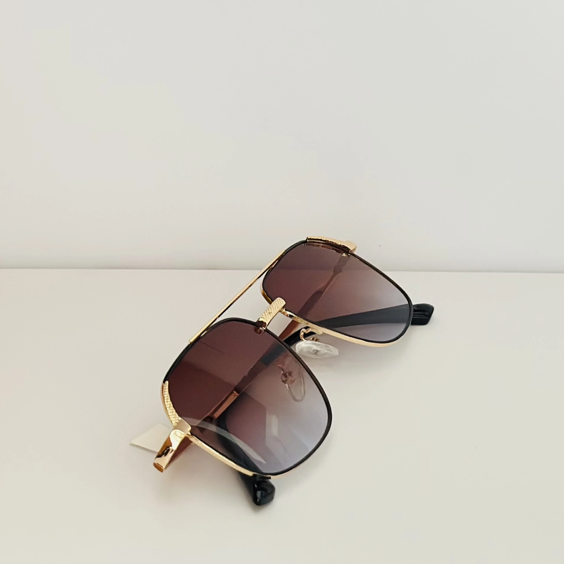 Vincent Chase by Lenskart brown square sunglasses with a golden frame