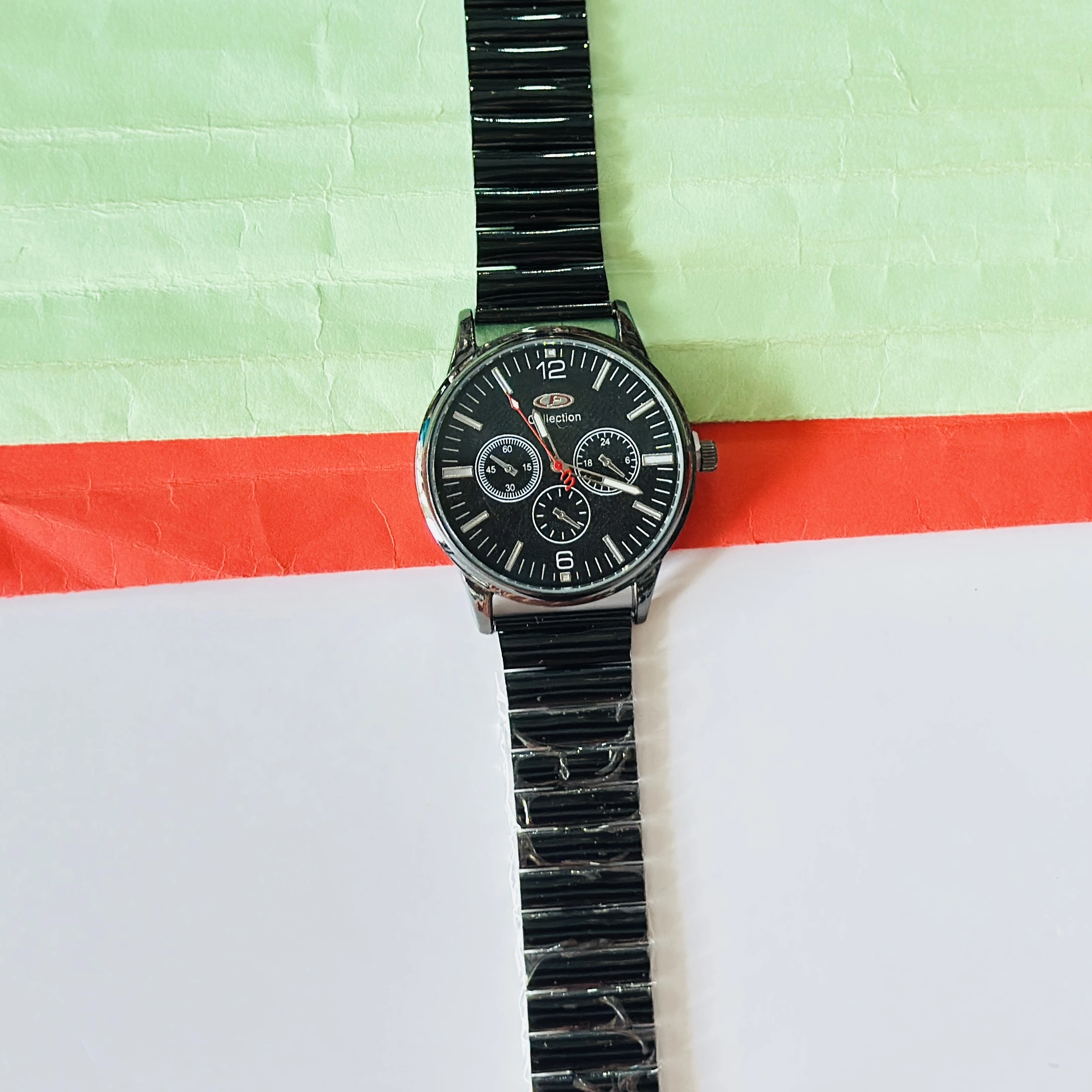 Black analog wristwatch