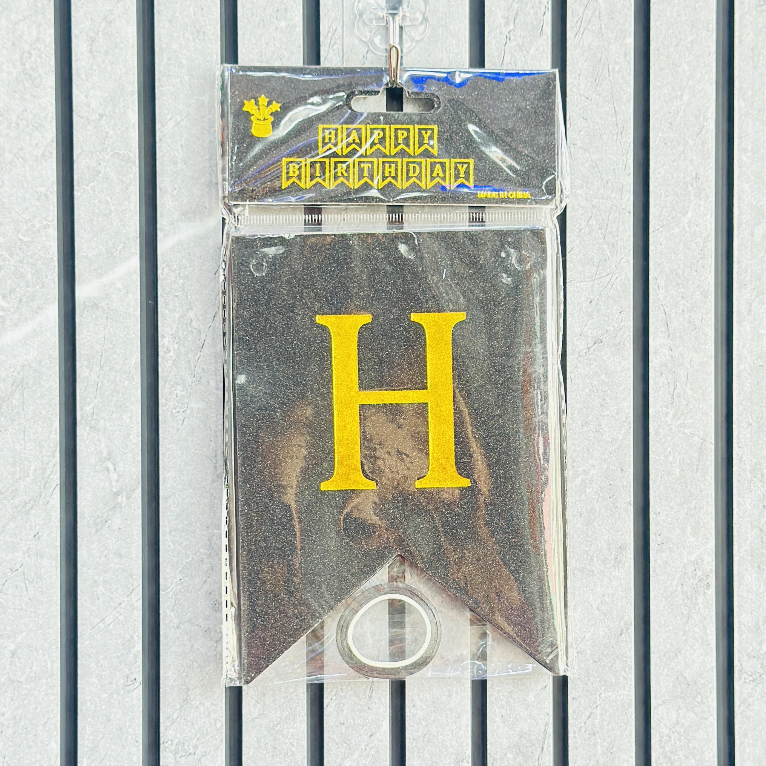 black and gold glitter "Happy Birthday" banner featuring pennant-style cards