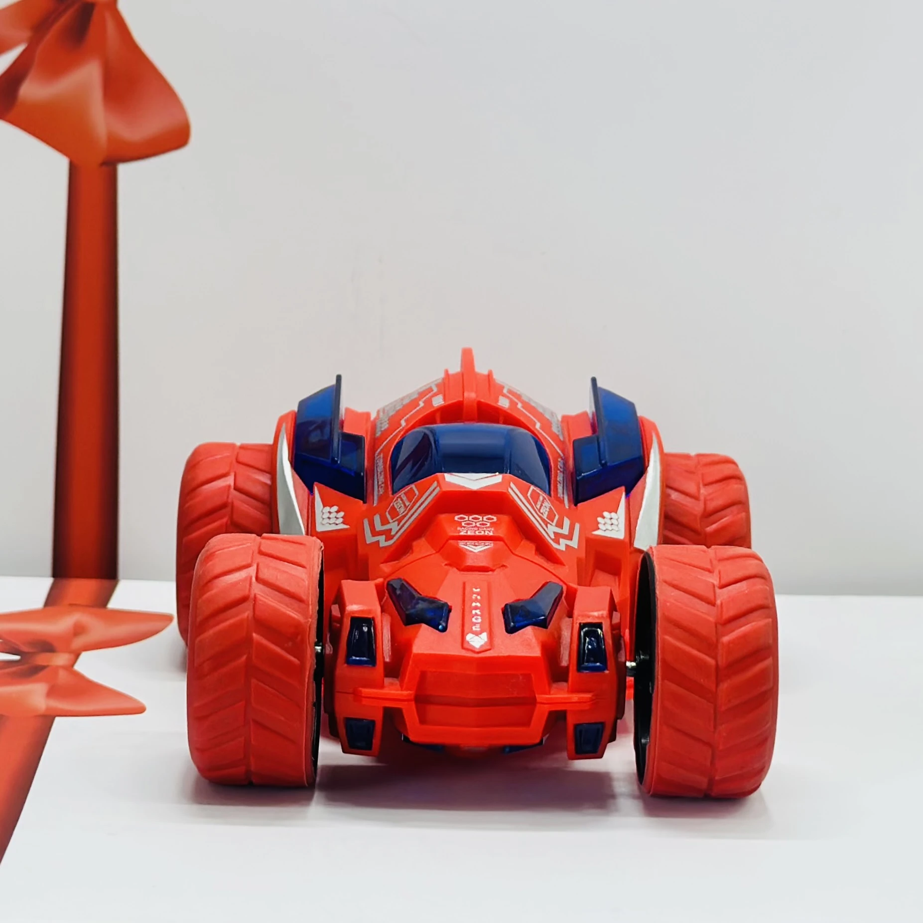 friction-powered toy stunt car