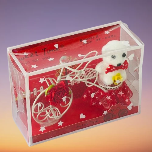 White Plastic Cycle with Teddy Bear and Rose Petals Gift Box