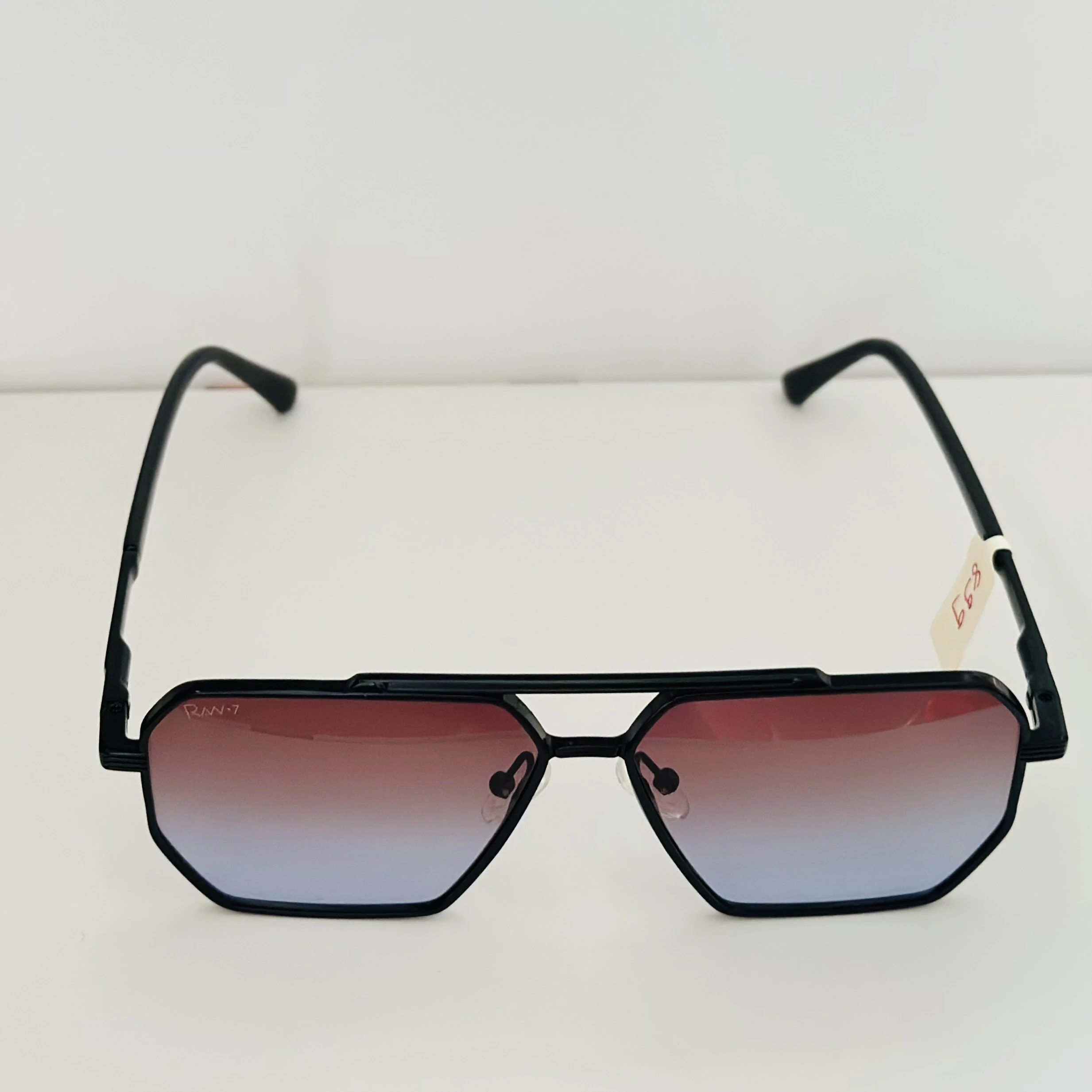 Black retro-style square sunglasses for men with gradient lenses.