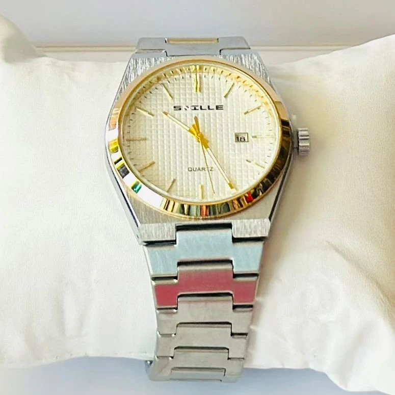 SNILLE PRX Watch  (silver and gold)  strap.