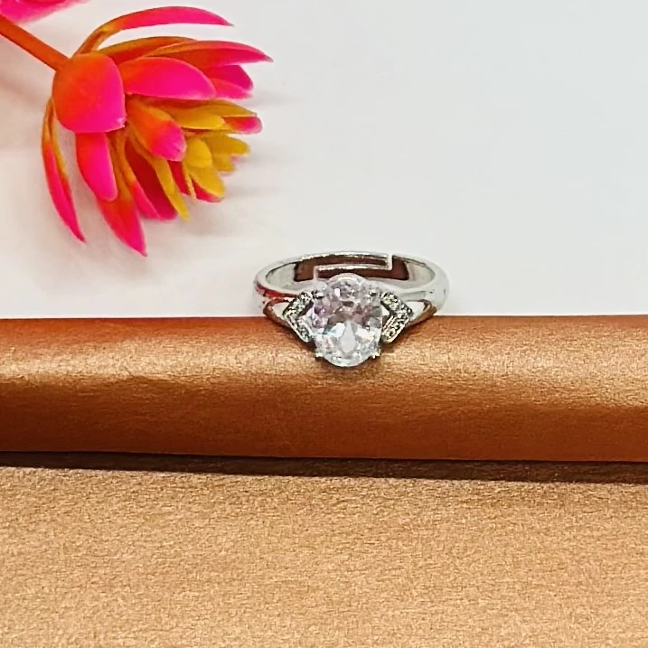 sterling silver or white gold diamond or moissanite engagement ring