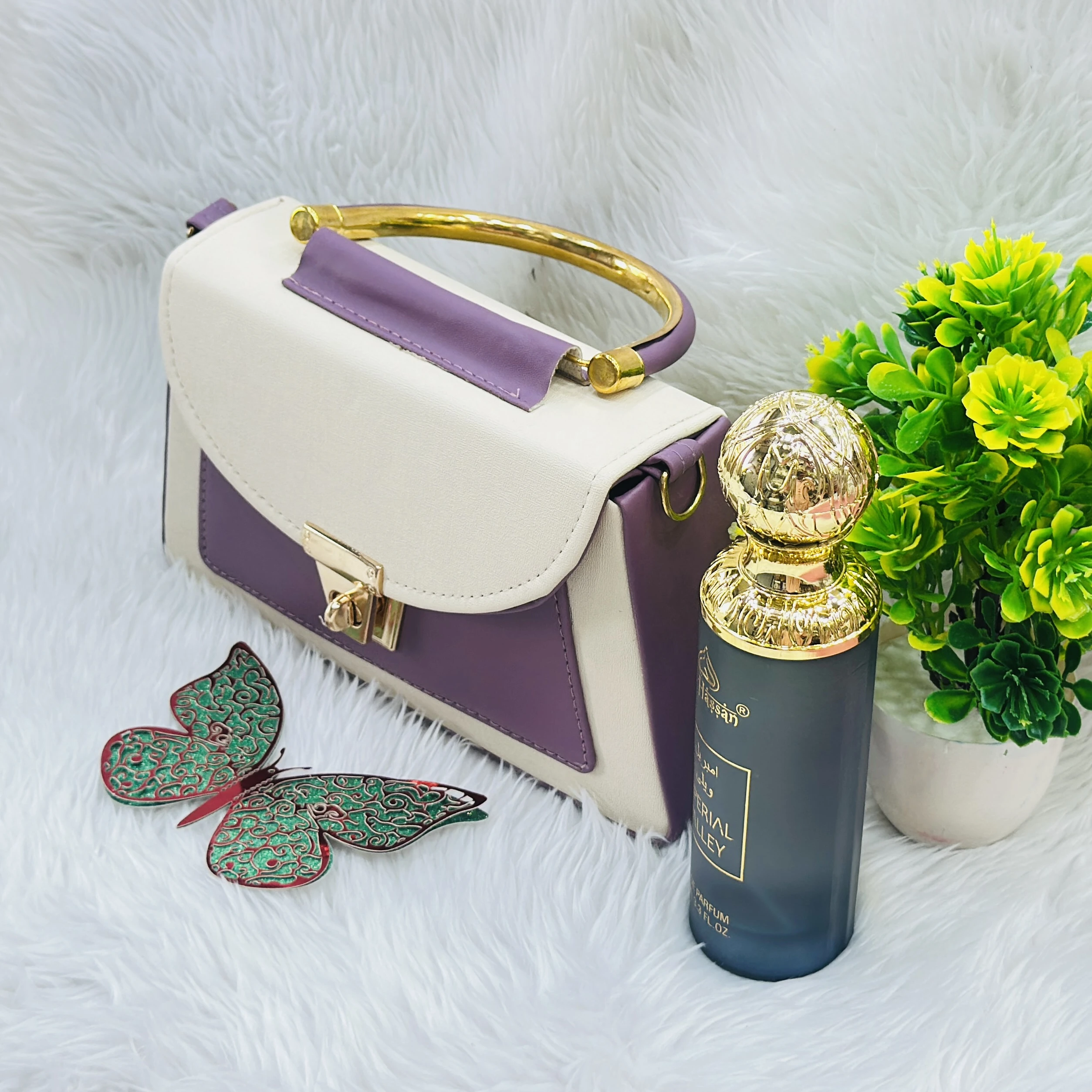 purple and cream top-handle handbag