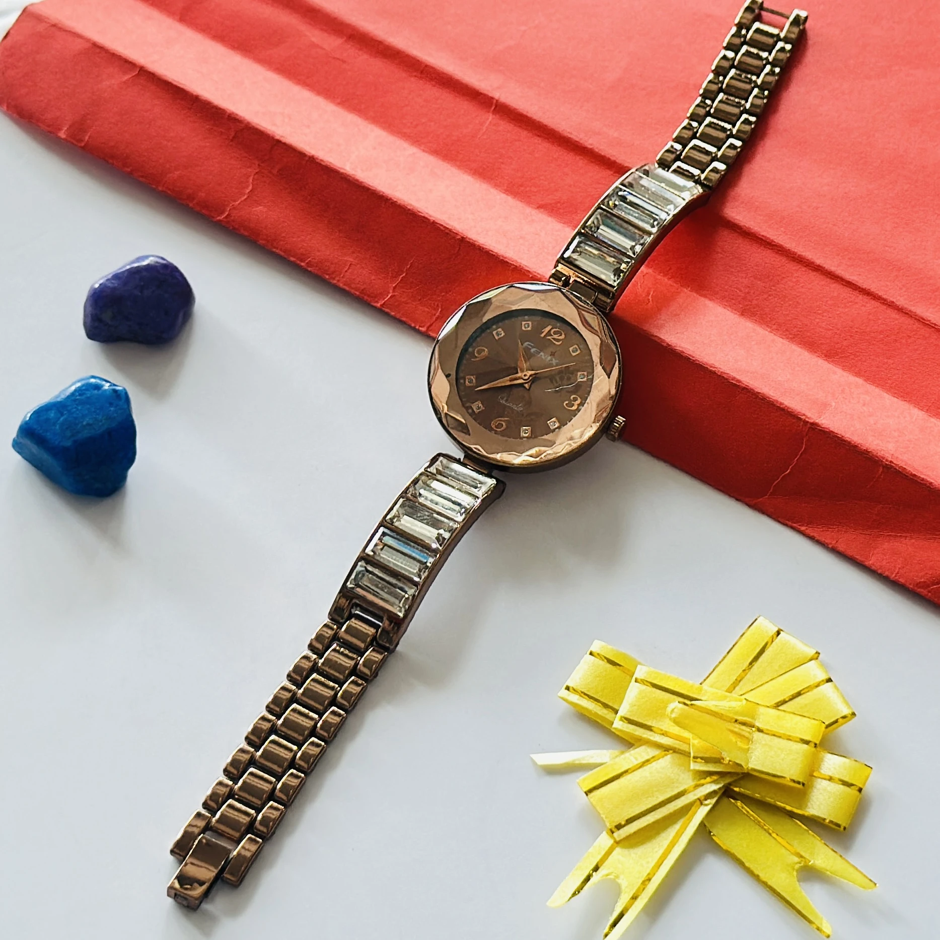 Brown Fenix analog watch for women