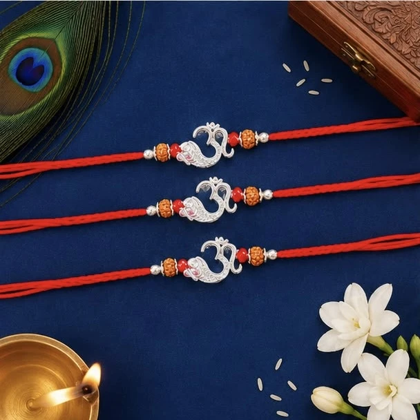 set features three sterling silver Om Rakhis designed for Raksha Bandhan.