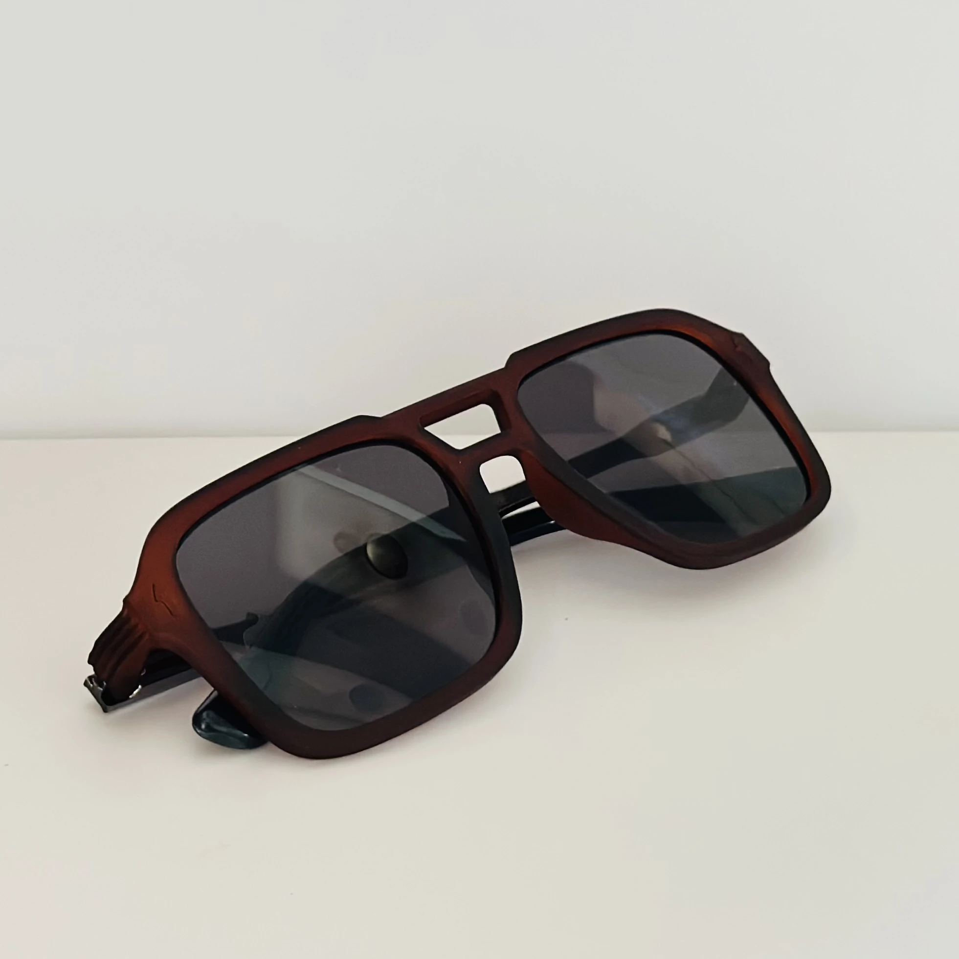 Cutler & Gross 1394 aviator sunglasses in a brown/cherry acetate frame.