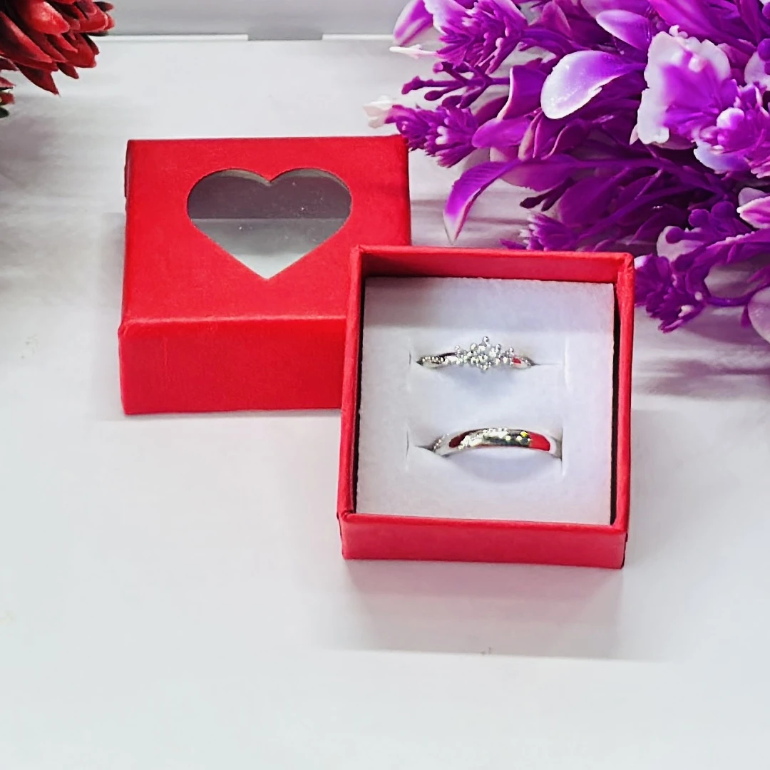 Set of rhodium-plated artificial couple rings