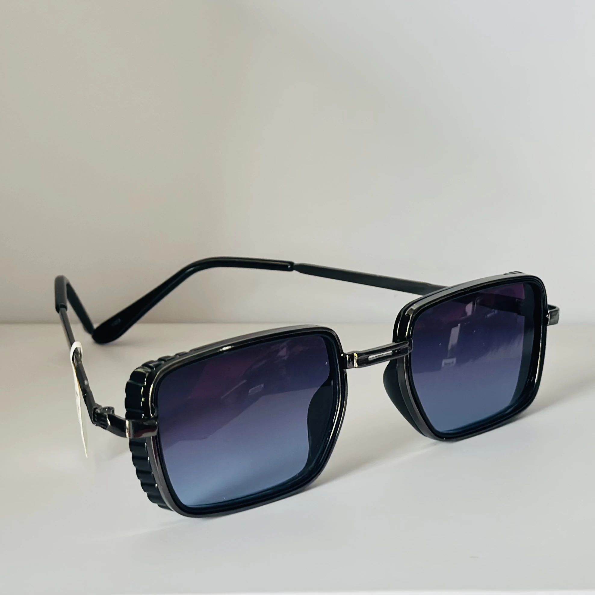 pair of Aedoll Goggle sunglasses with a gold metal frame and pink gradient lenses.
