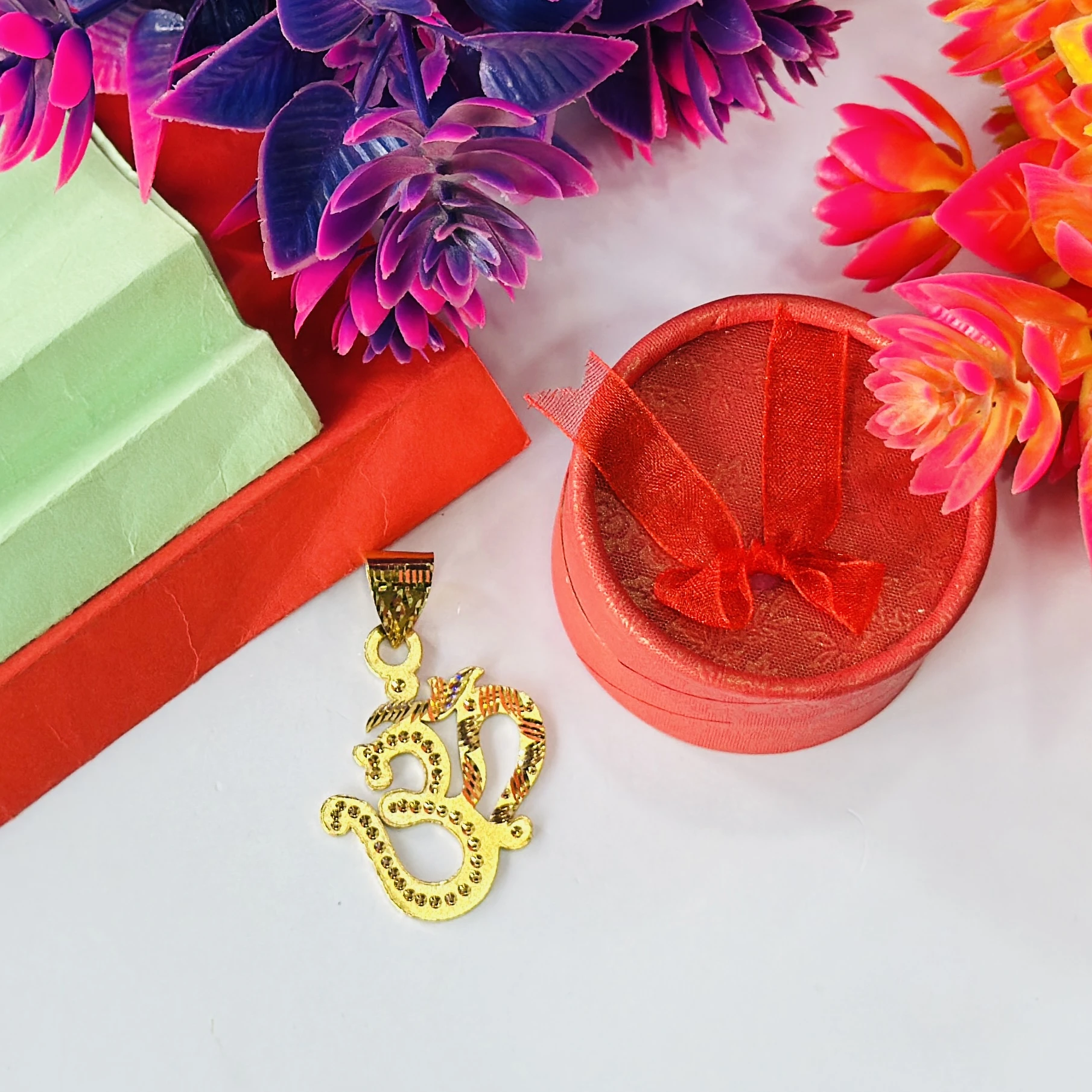 Gold plated 'Om' symbol pendant
