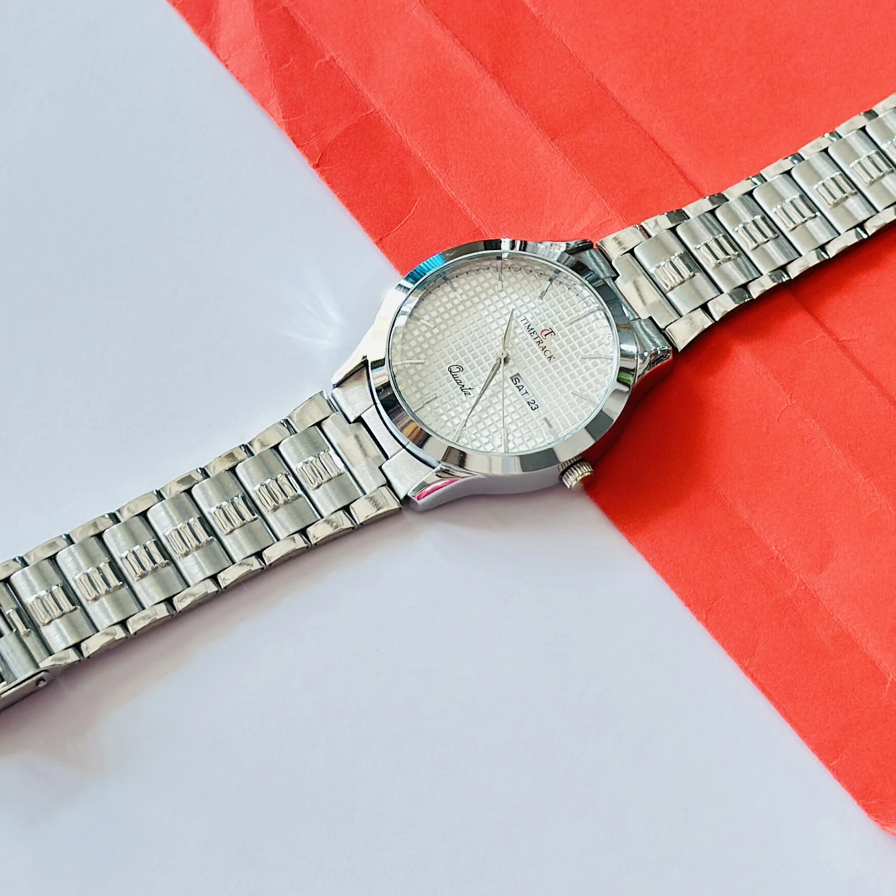 silver-toned stainless steel analogue watch