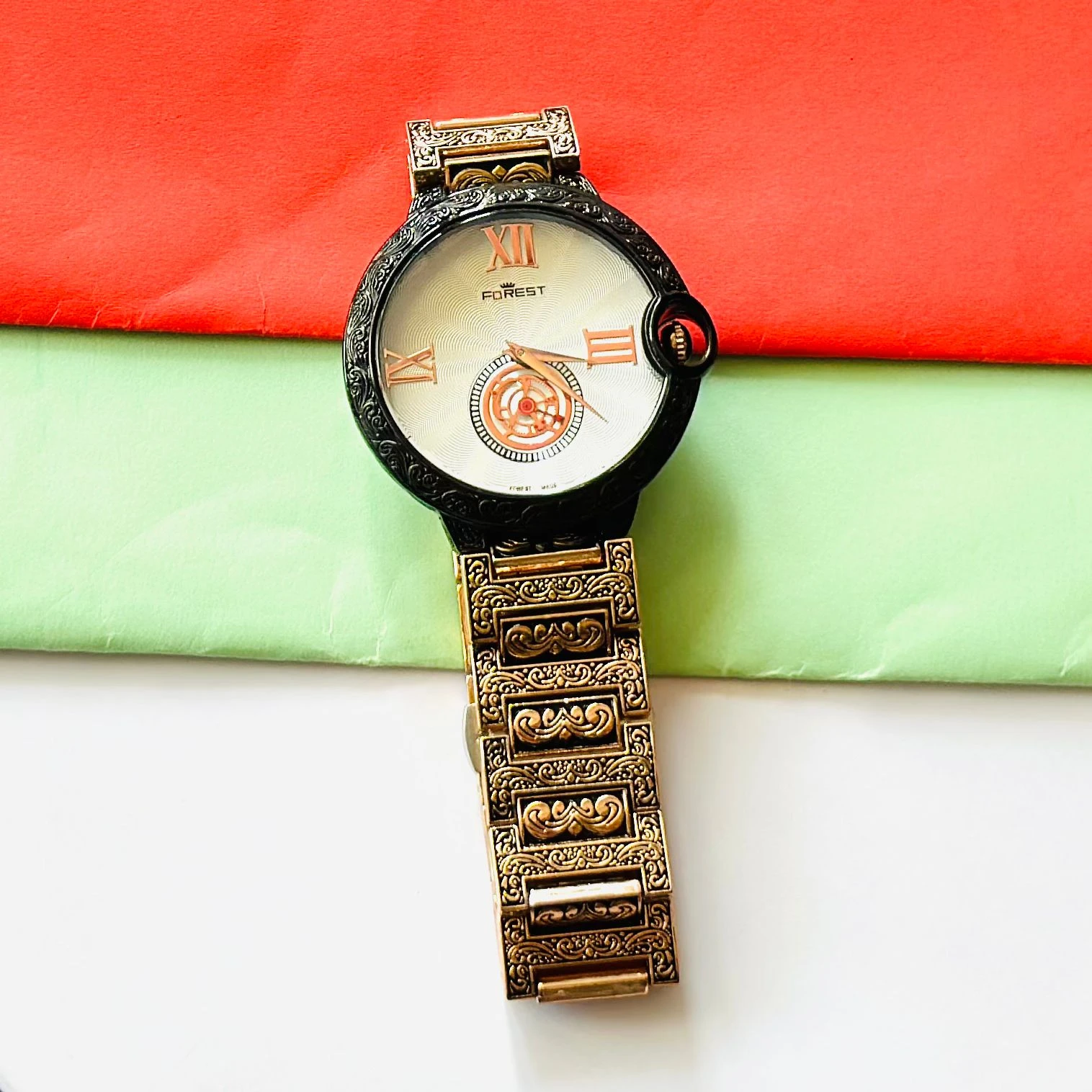 Forest Quartz Date watch with a gold-tone metal band