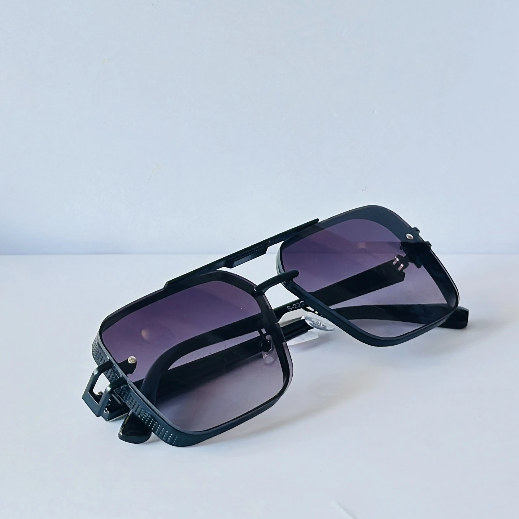 sunglasses are the Dita Mach-Six model,