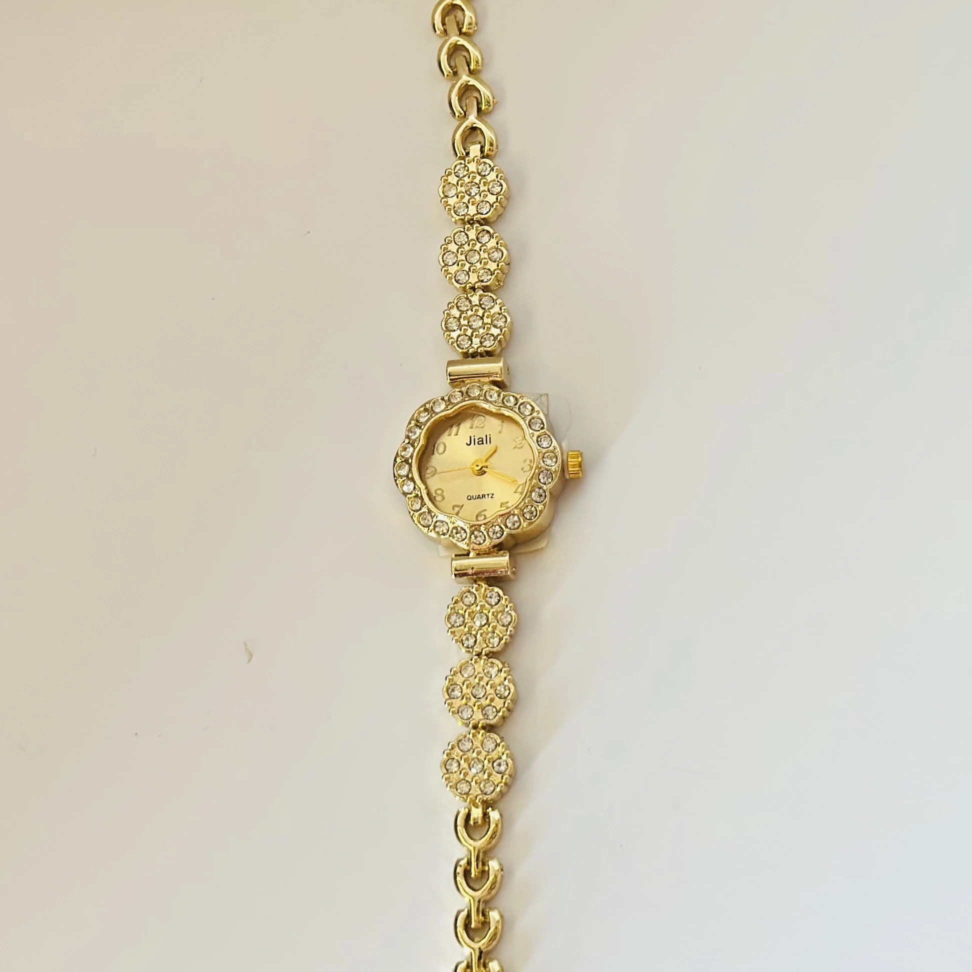Gold tone quartz watch